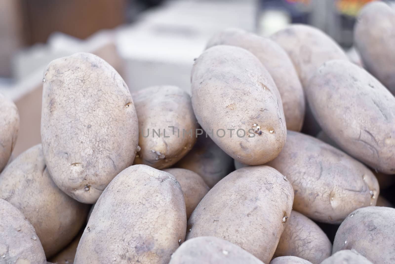 Pile of old potatoes for sale  to the market