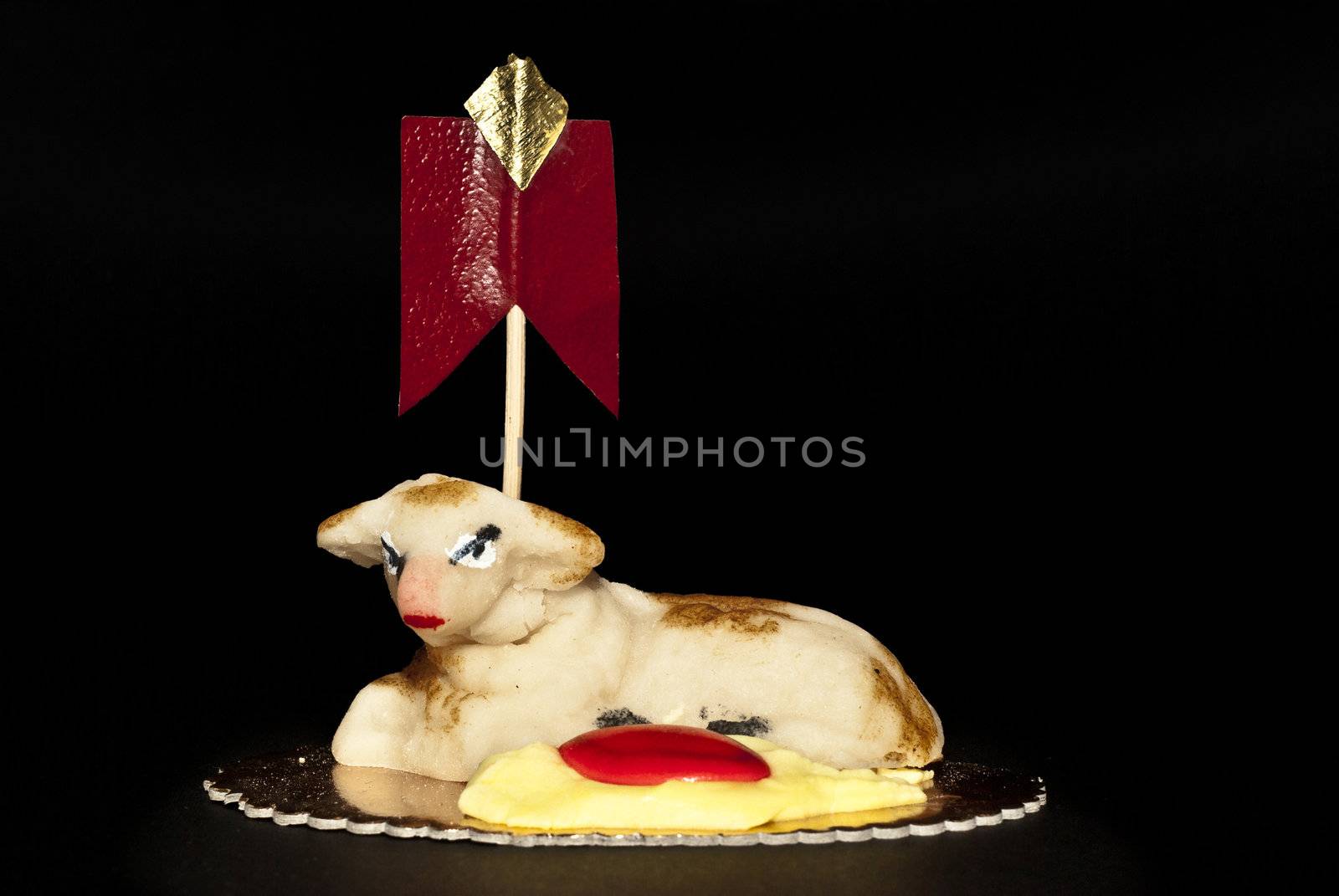 Homemade marzipan  Sheep cake, Easter cake typical in Sicily, isolated on black