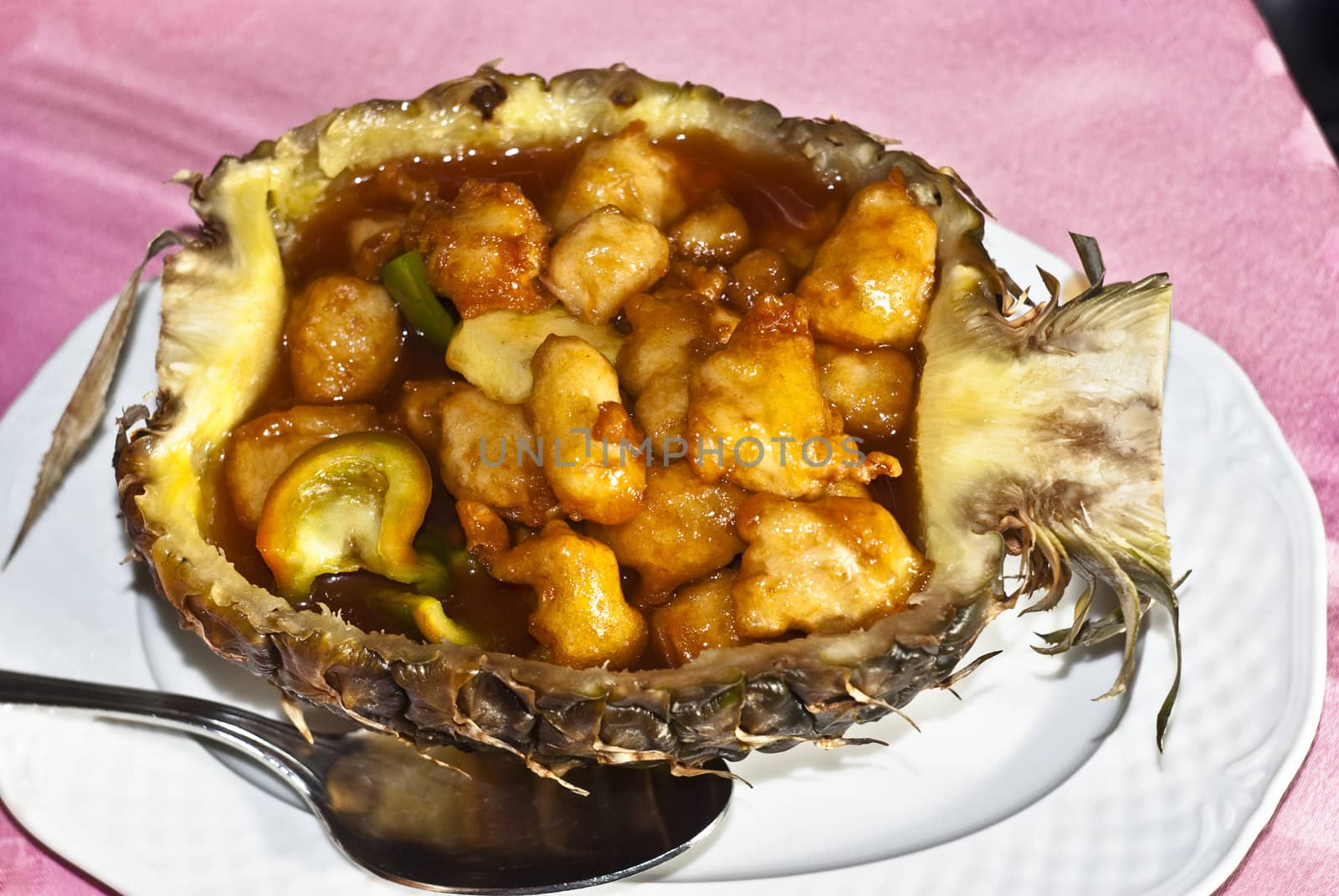 Chinese chicken sweet and sour sauce inside pineapple