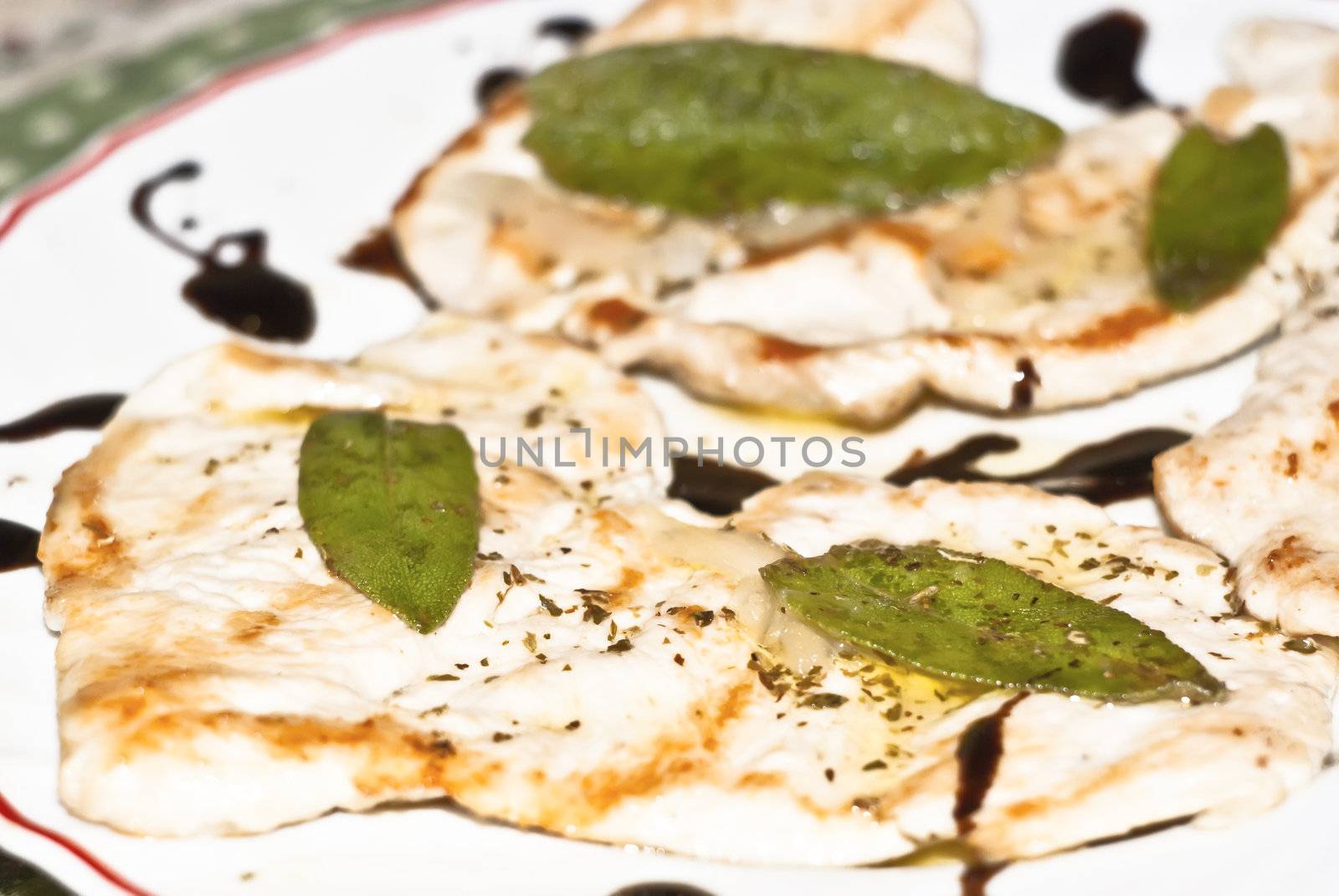 Chicken Breast with a sage and cream of balsamic vinegar.