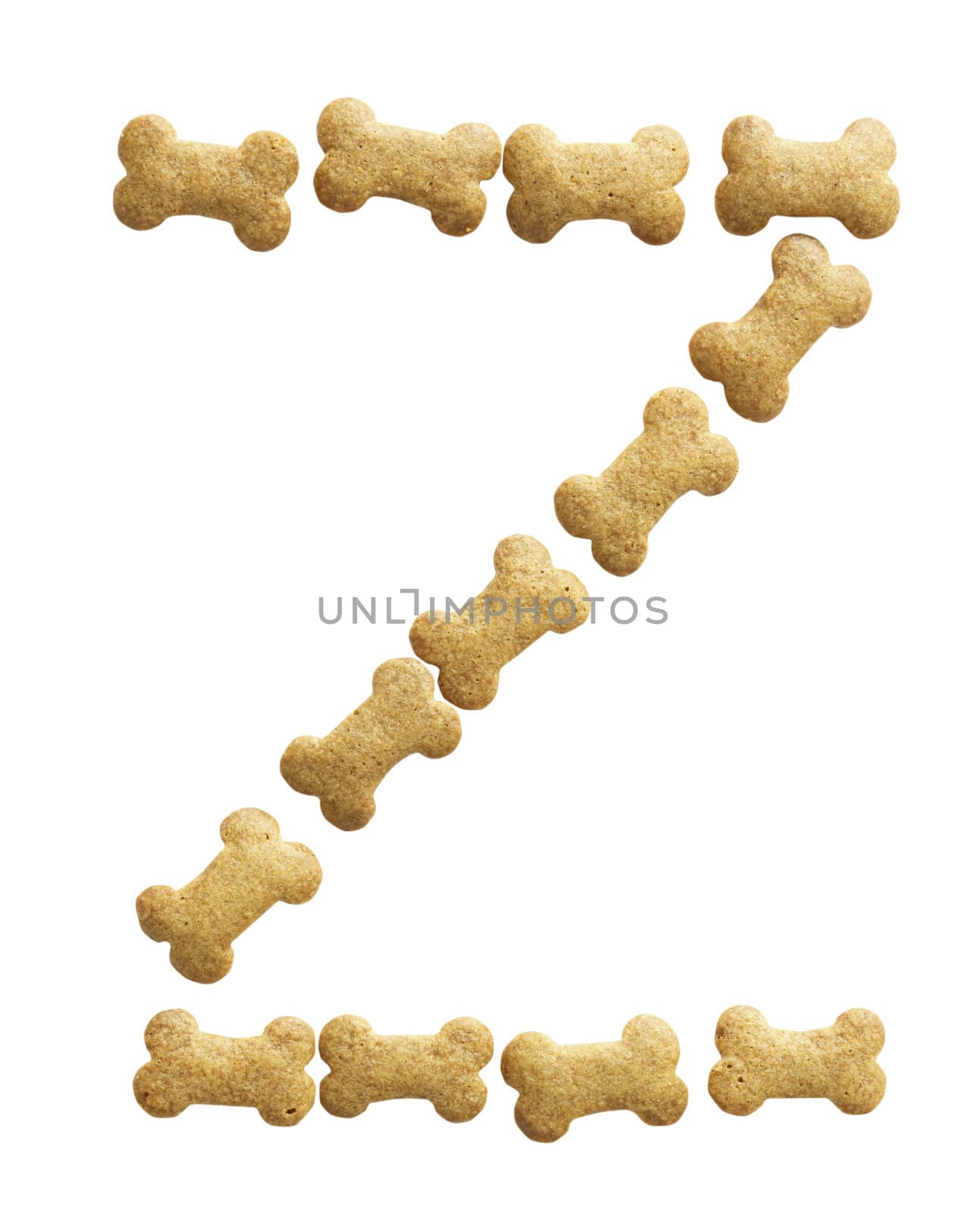 Letter Z made of bone shape dog food on white background, shot directly from above