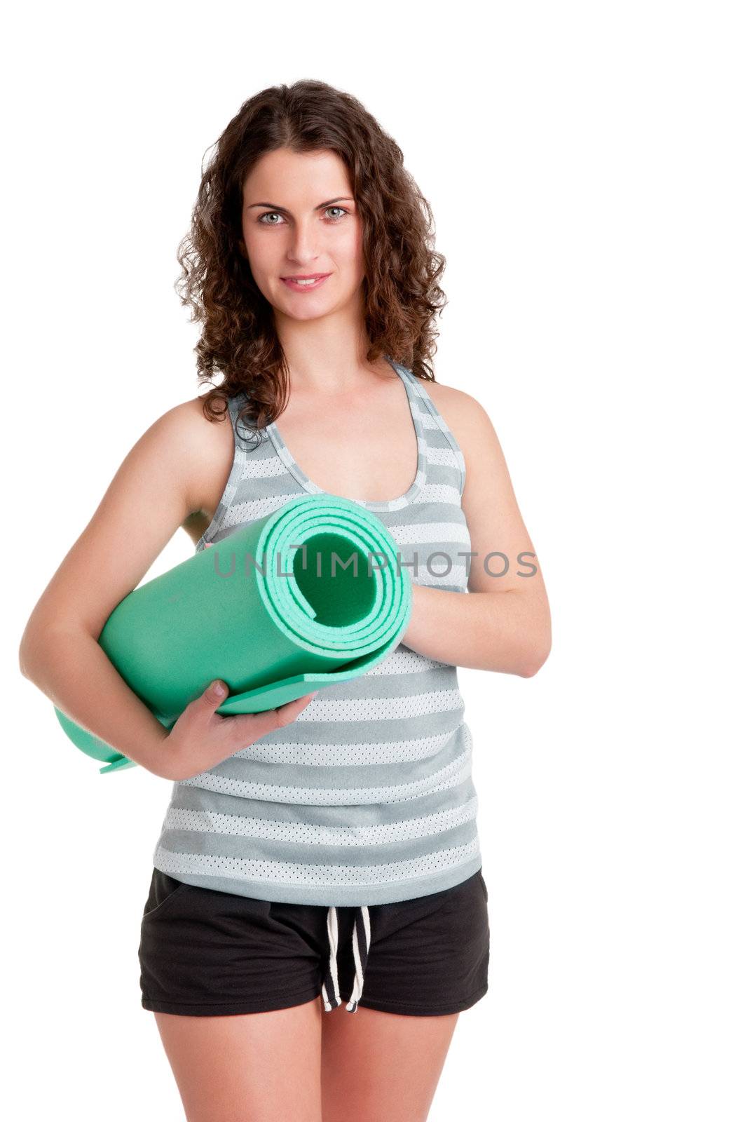 Woman holding a yoga mat, isoalated in a white background