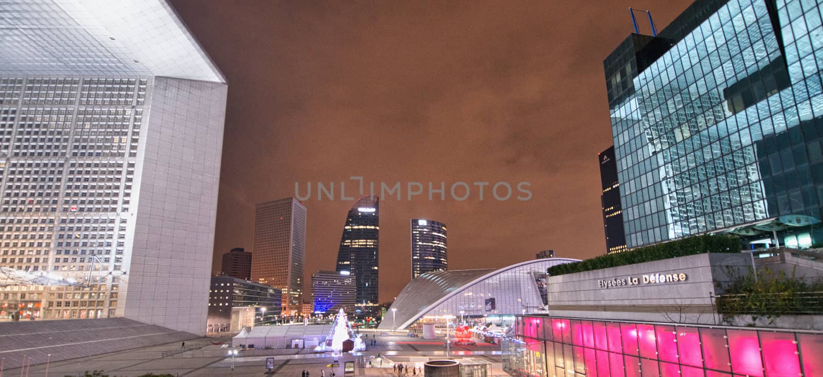 PARIS - DEC 1: La Defense business district at dusk on December 1, 2012 in Paris. La Defense is the biggest business district in France and most of companies have an office in this area