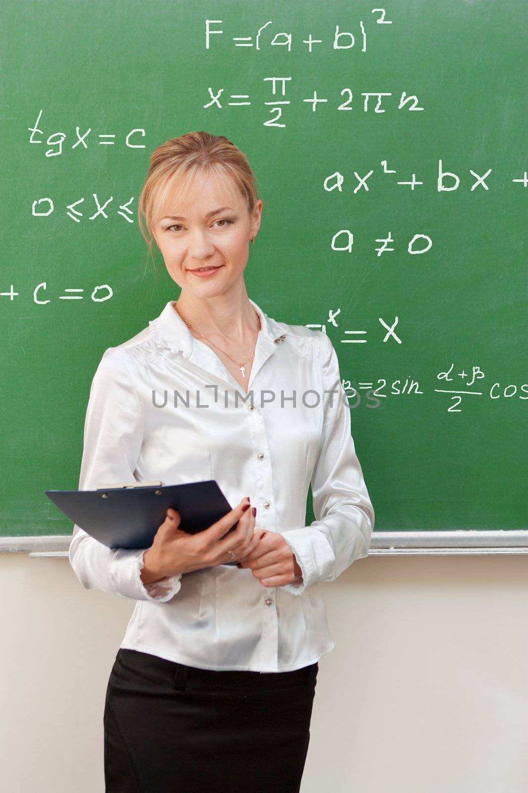 teacher in classroom by nigerfoxy