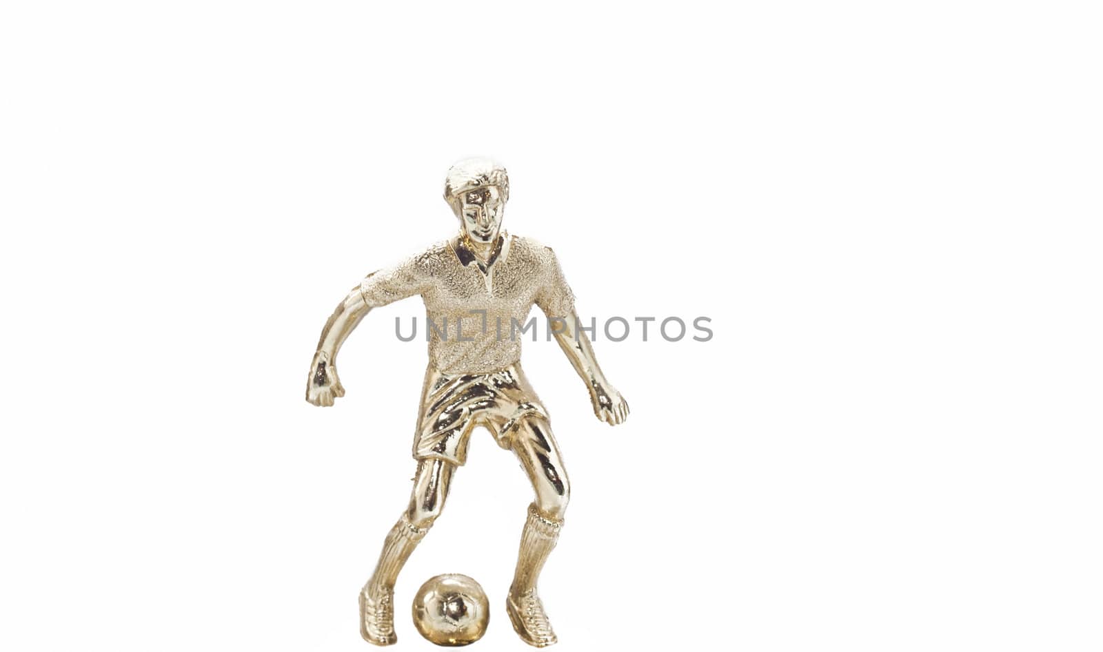 Golden statue of football player isolated on white background