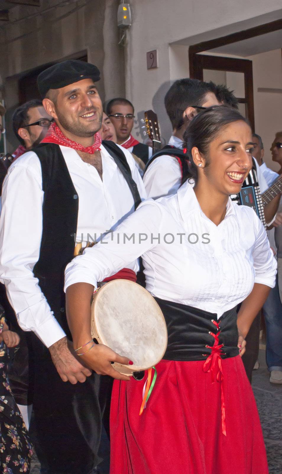 POLIZZI GENEROSA, SICILY - AUGUST 21: Sicilian folk group from Polizzi G. at the International "Festival of hazelnuts",dance and parade through the city: August 21, 2011 in Polizzi Generosa,Sicily, Italy