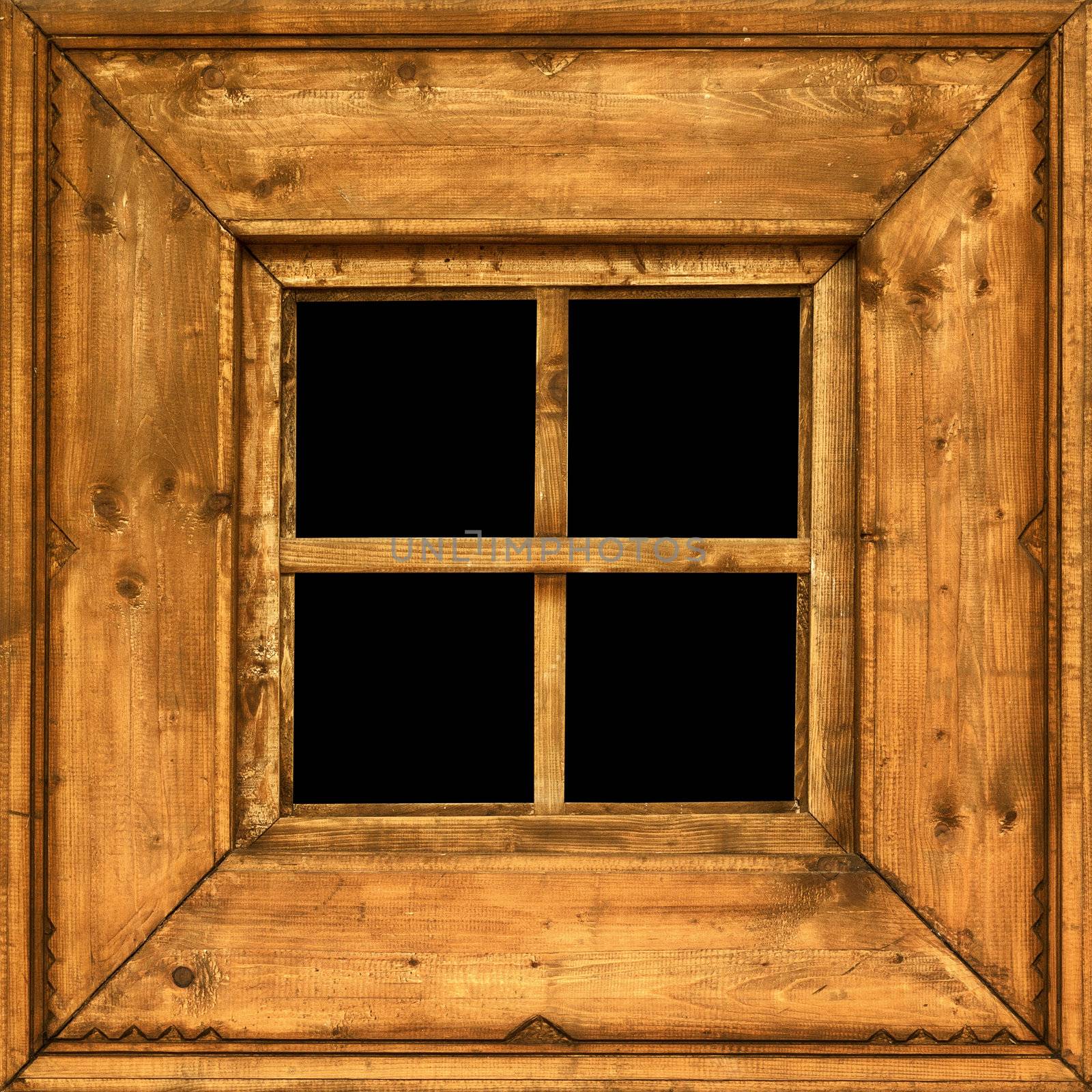 An old square wooden rural window frame
