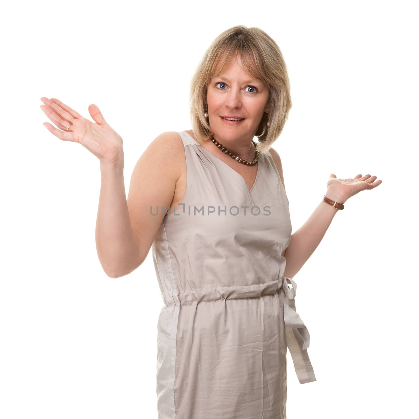 Attractive Smiling Mature Woman Holding Hands Up in Surprise Isolated