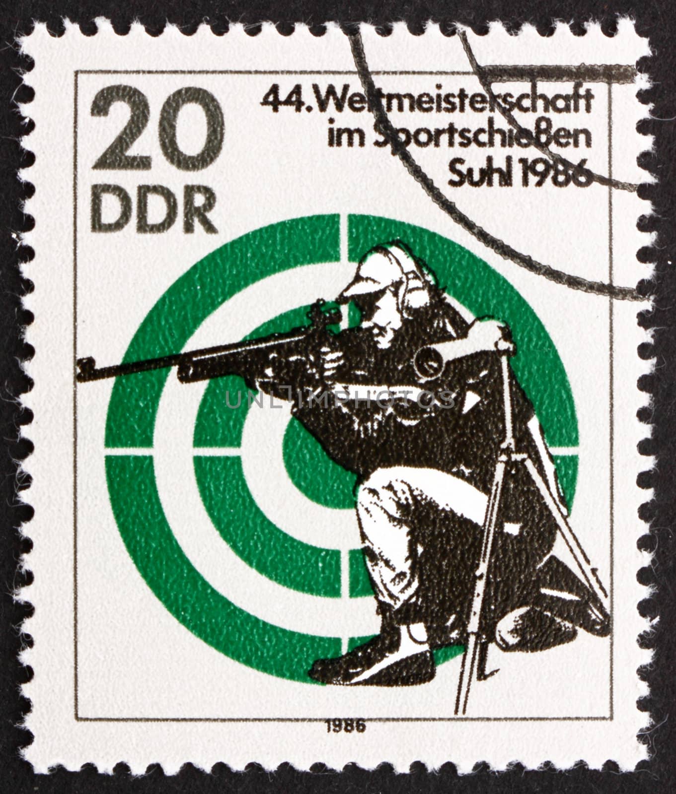 GDR - CIRCA 1986: a stamp printed in GDR shows Rifle Shooting, 44th World Sports Shooting Championships, Suhl, circa 1986