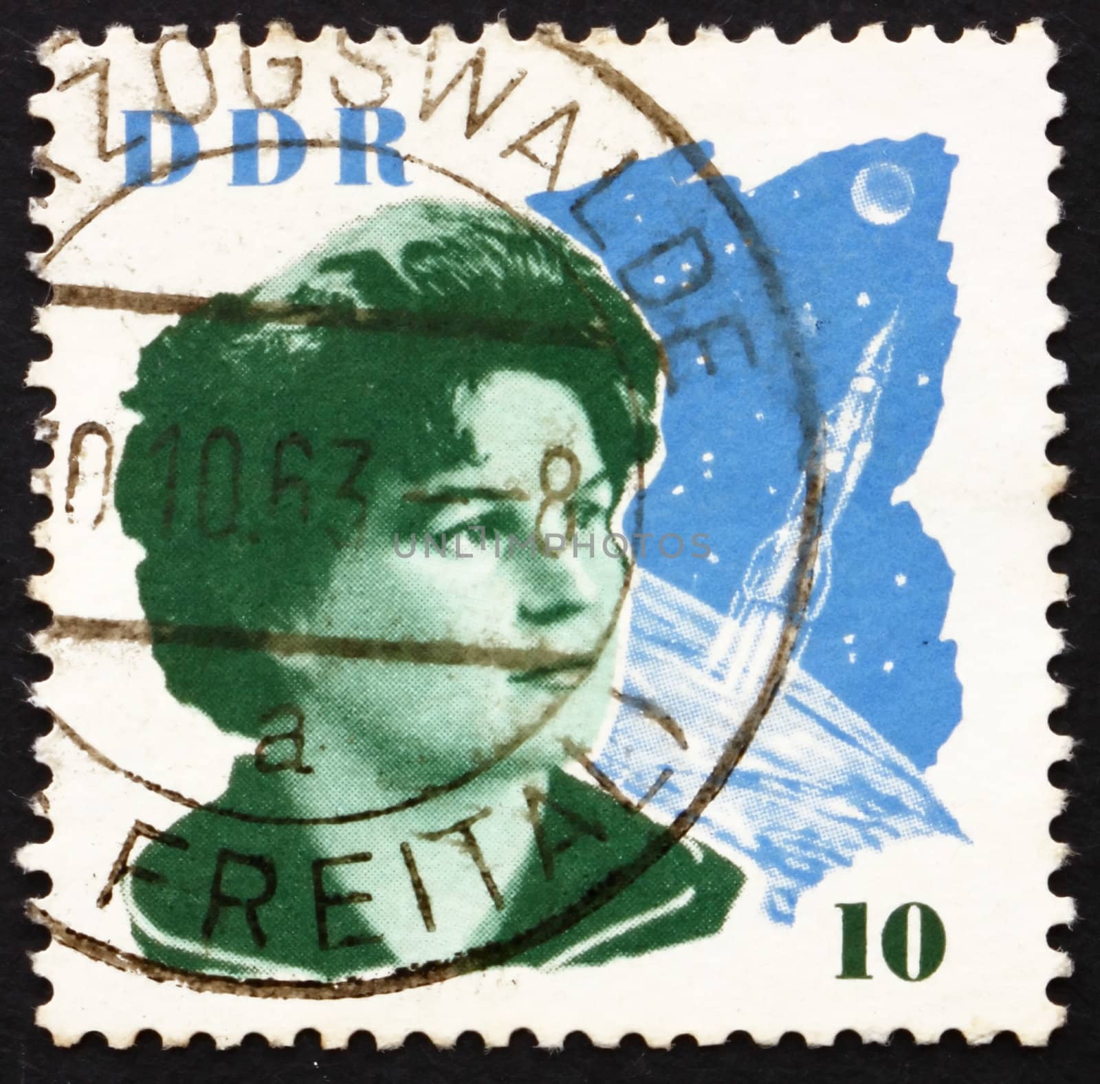 GDR - CIRCA 1963: a stamp printed in GDR shows Valentina Tereshkova and Space Craft, the First Woman in Space, circa 1963