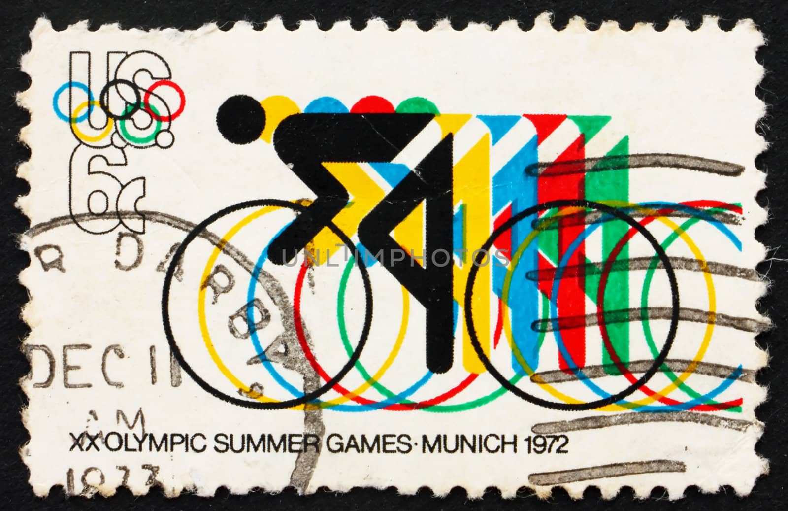 UNITED STATES OF AMERICA - CIRCA 1972: a stamp printed in the USA shows Bicycling and Olympic Rings, 20th Summer Olympic Games, Munich, Germany, circa 1972