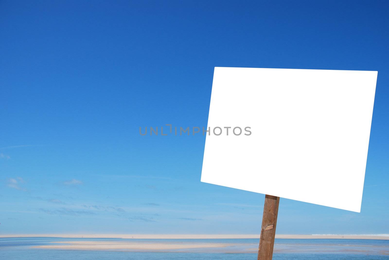 empty sign at the beach isolated on white (blue sky background, copy-space available for design)