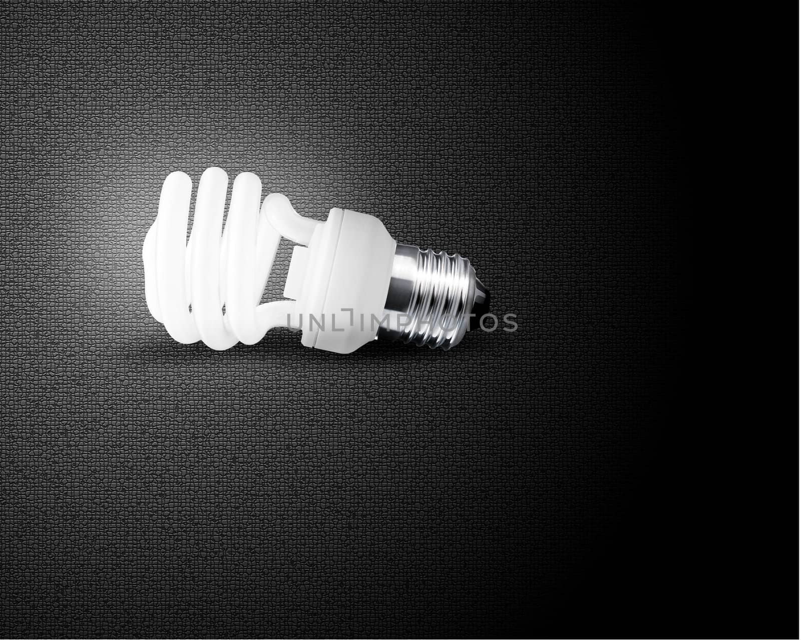 one glowing Light bulb on black background