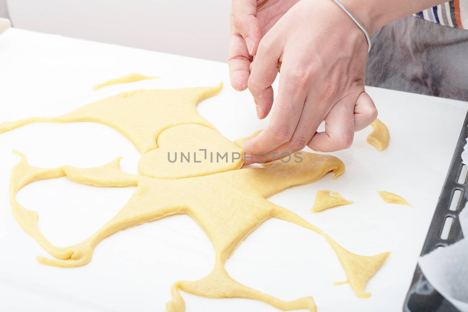making cookies in the shape of a heart of the earth made handmade with natural ingredients