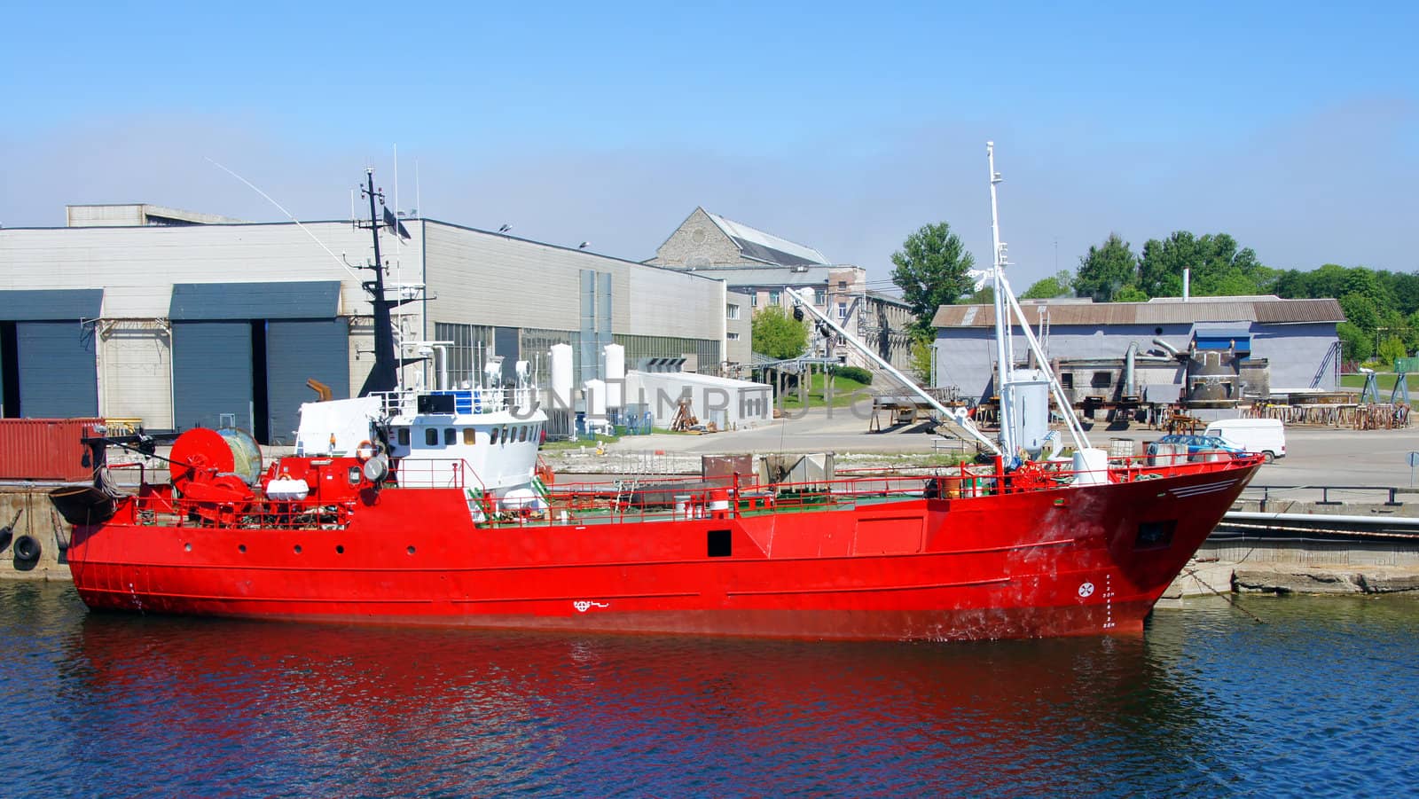 The fishing vessel costs at a mooring