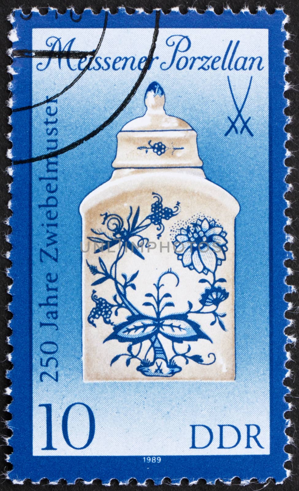 GDR - CIRCA 1989: a stamp printed in GDR shows Tea Caddy, 250th Anniversary of Meissen Onion-pattern Porcelain and Sword Emblem, circa 1989