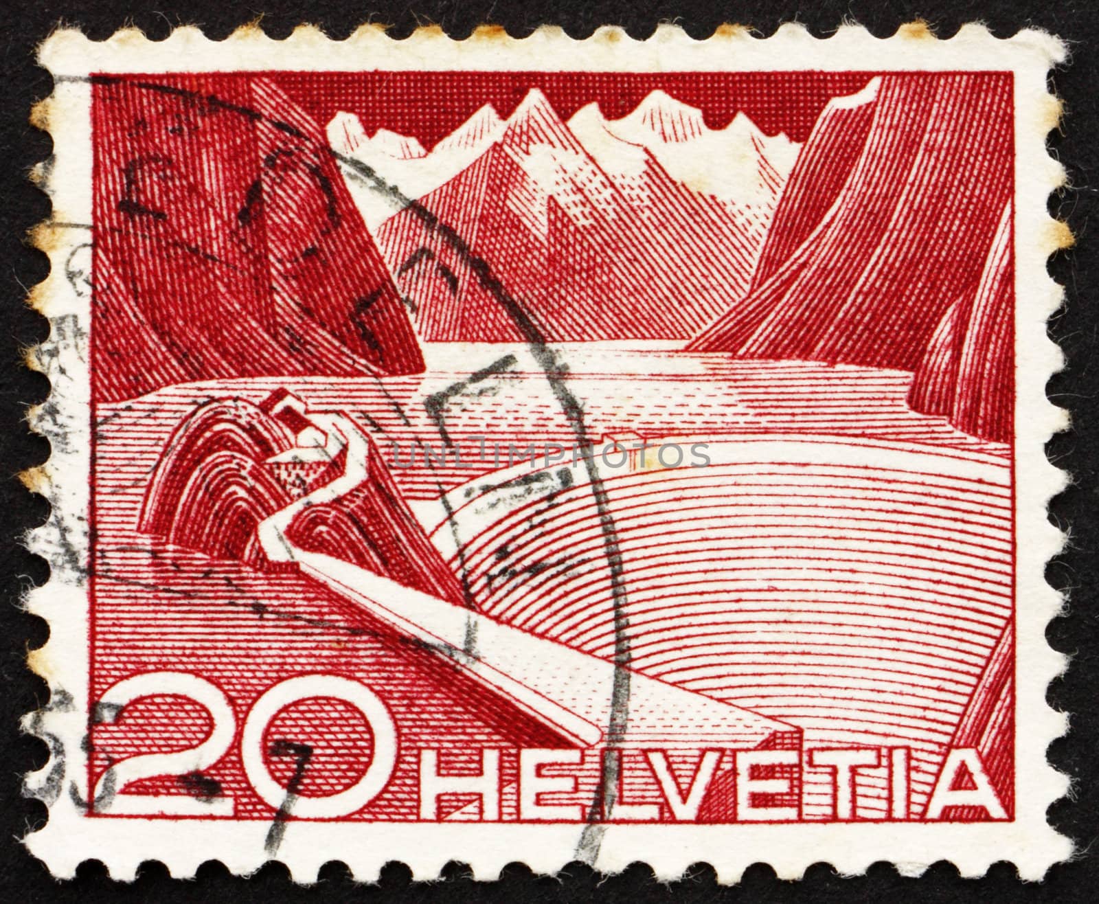 SWITZERLAND - CIRCA 1949: a stamp printed in the Switzerland shows Reservoir, Grimsel, Switzerland, circa 1949