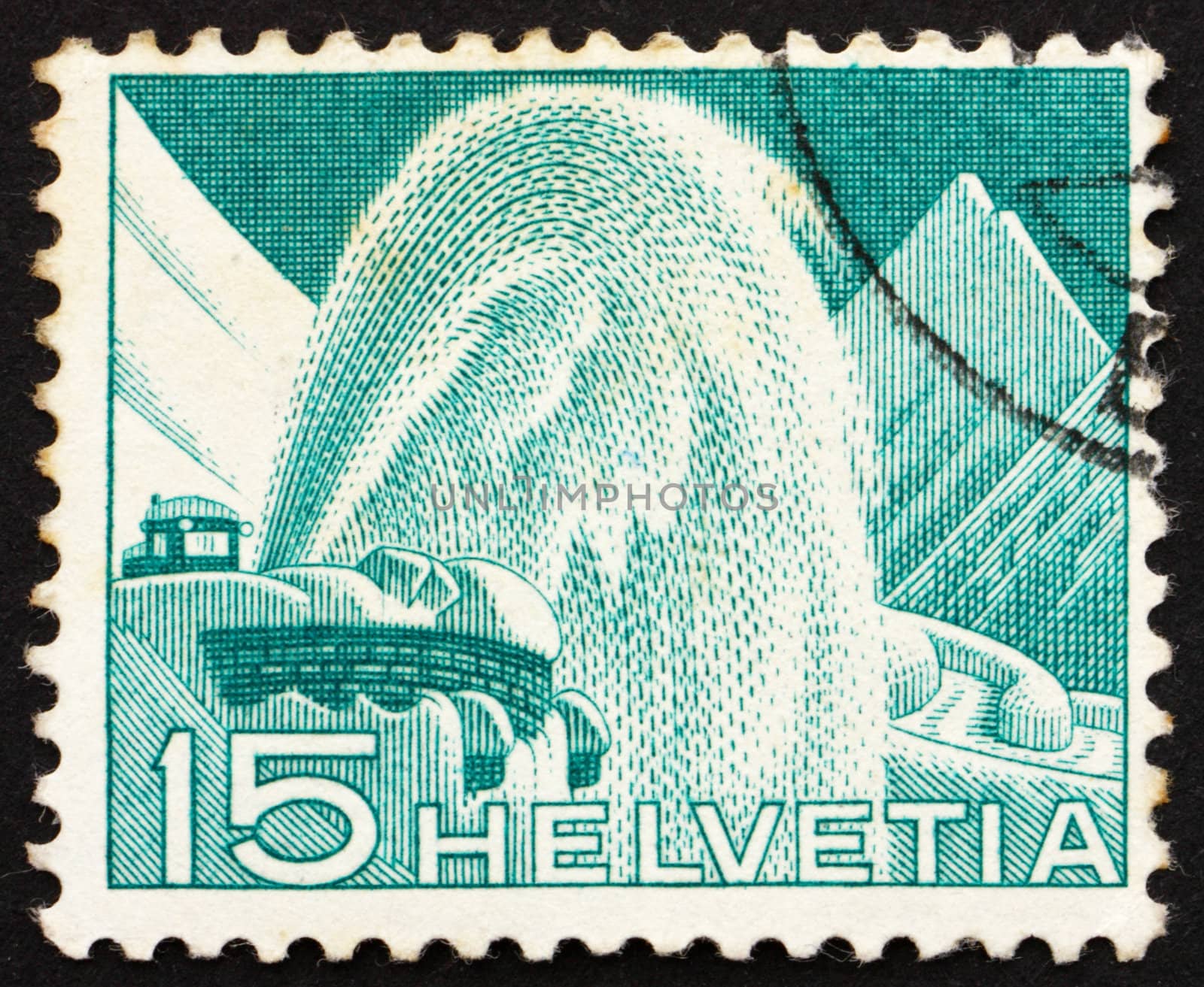 SWITZERLAND - CIRCA 1949: a stamp printed in the Switzerland shows Rotary Snow Plow, circa 1949