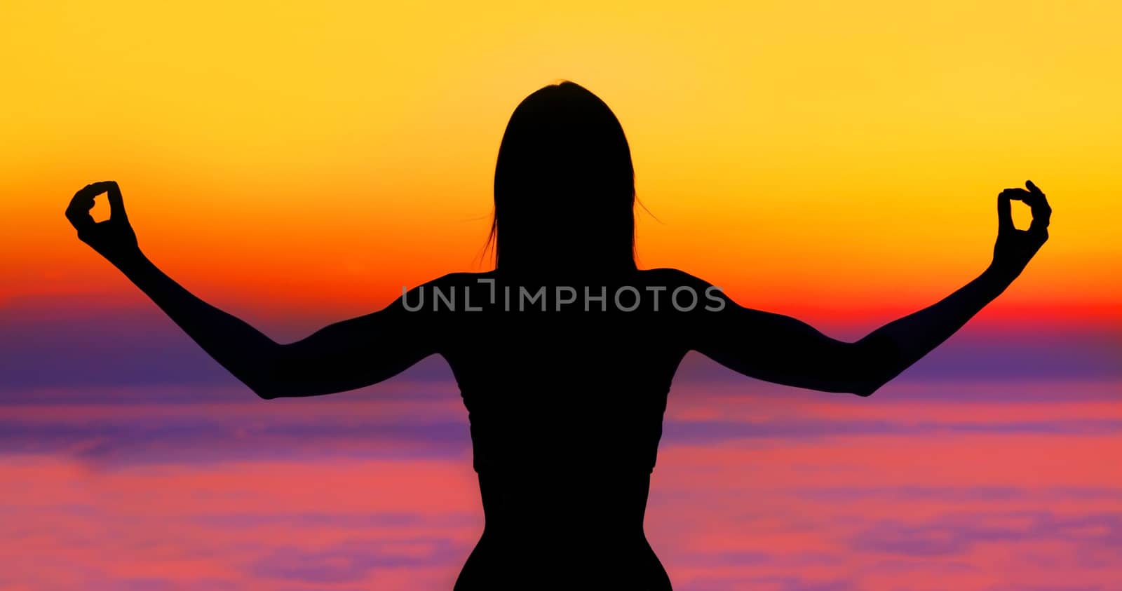 Yoga woman over sunset by Anna_Omelchenko