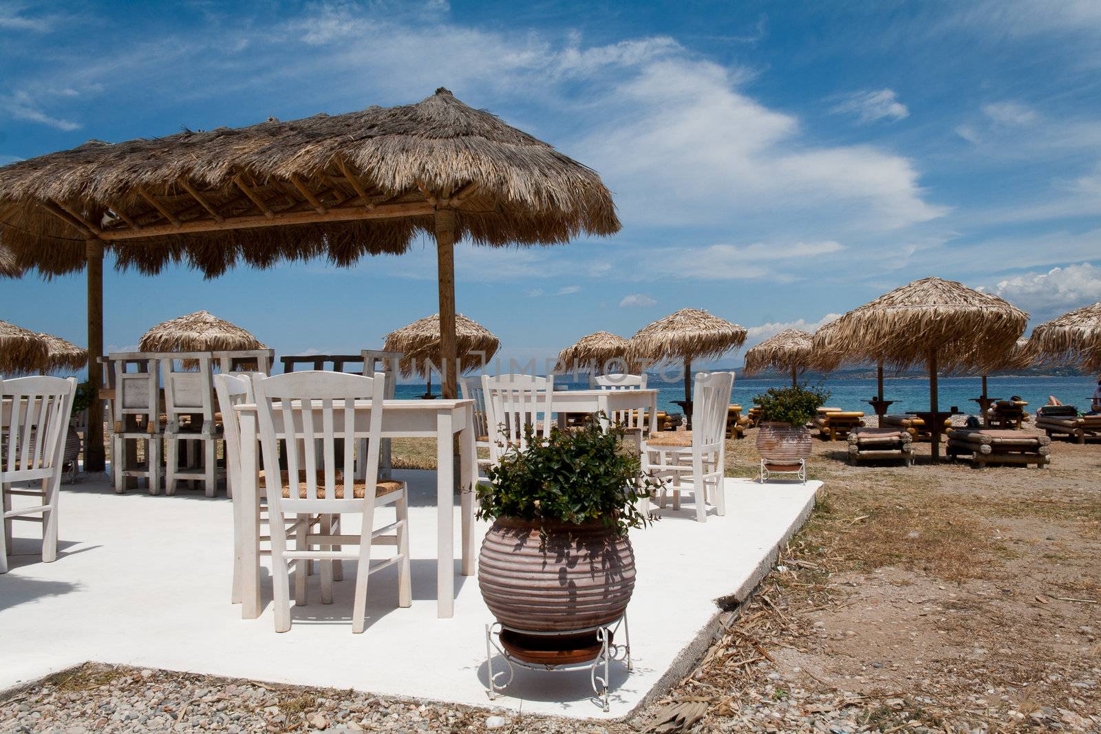 Greek taverna on the beach by vilevi