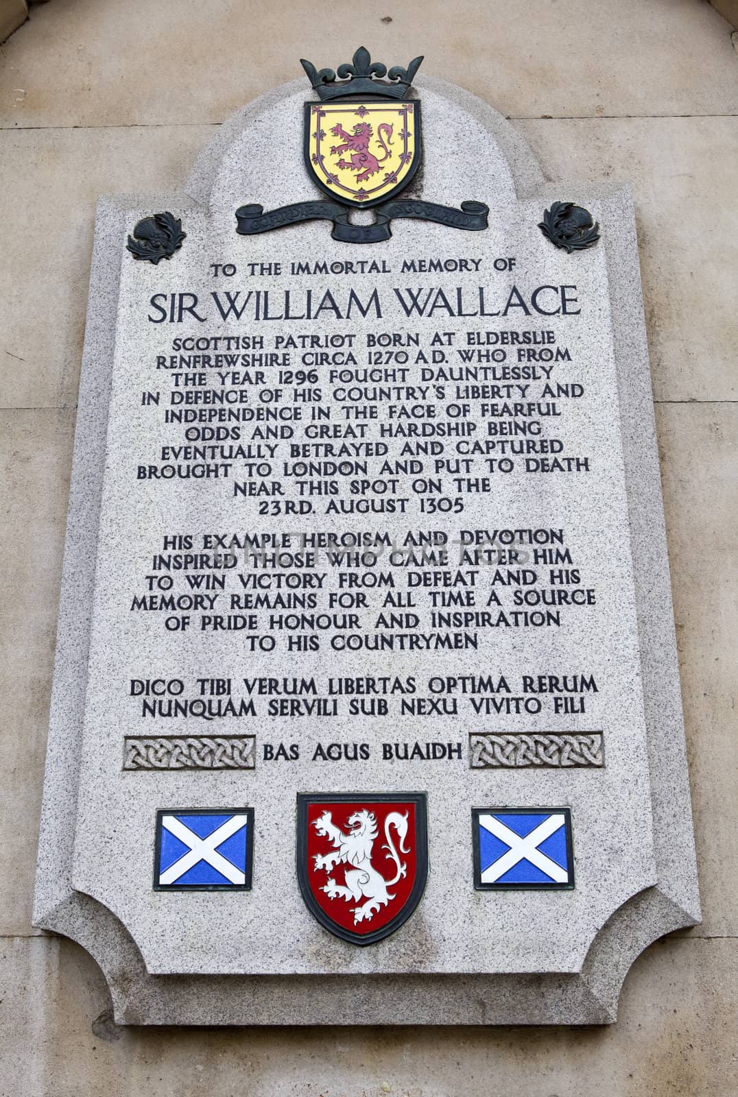 Sir William Wallace memorial plaque on the wall of St.Bartholomews Hospital in Smithfield, London - the location of his execution in 1305.