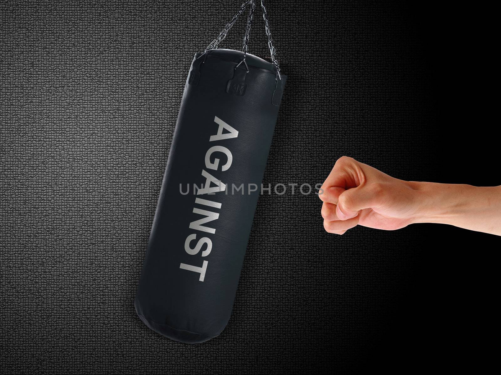 boxing punch bag and hand punching it on black background
