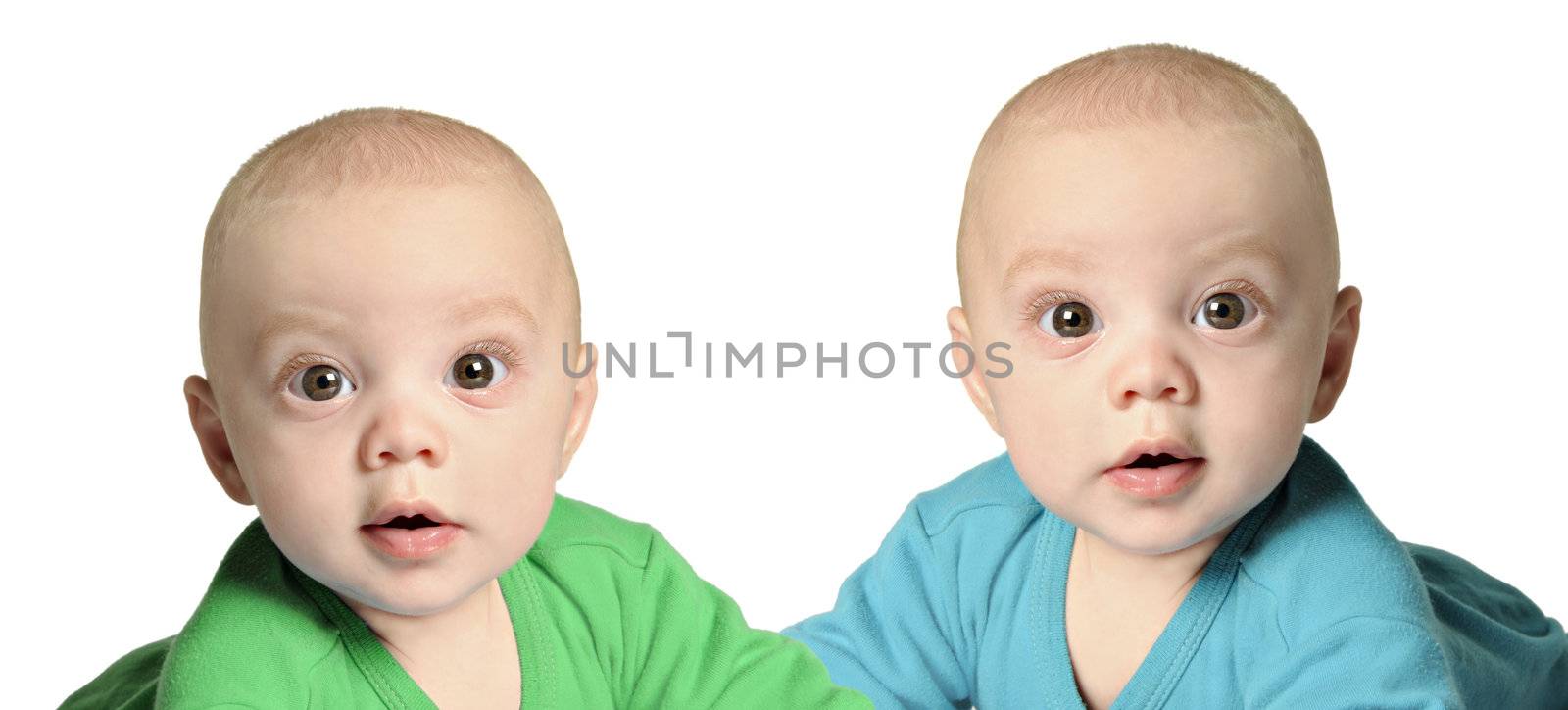 Twin baby boys in blue and green