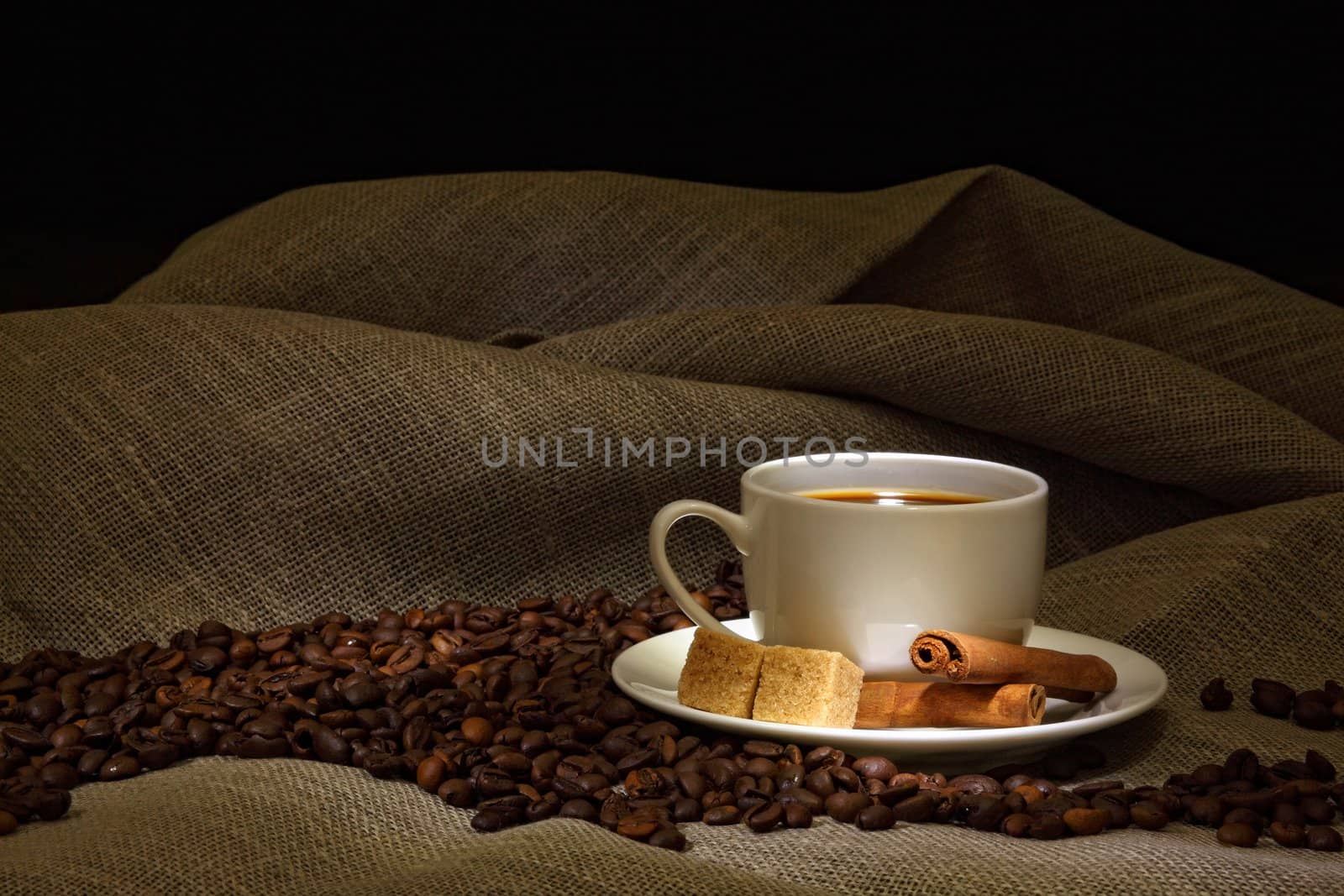 Coffee beans and white cup by sergey_nivens