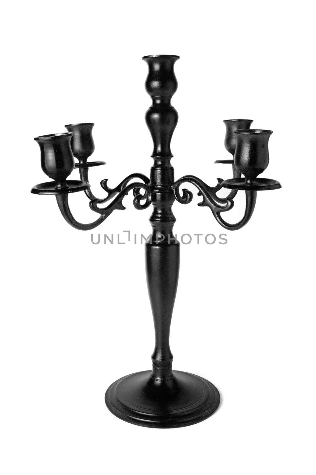 Tall black candle. On a white background.