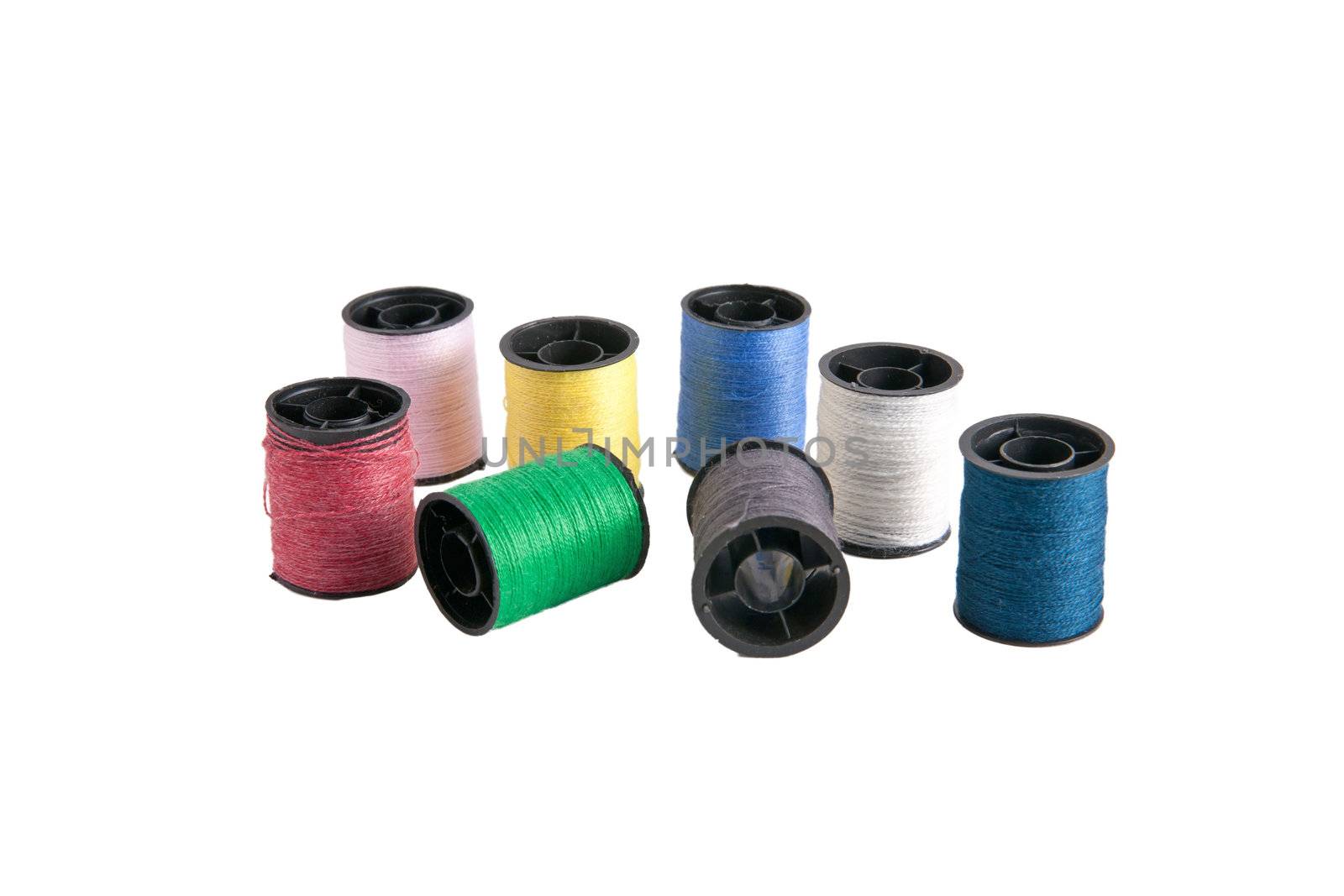 Roll thread used for sewing are available in various colors.