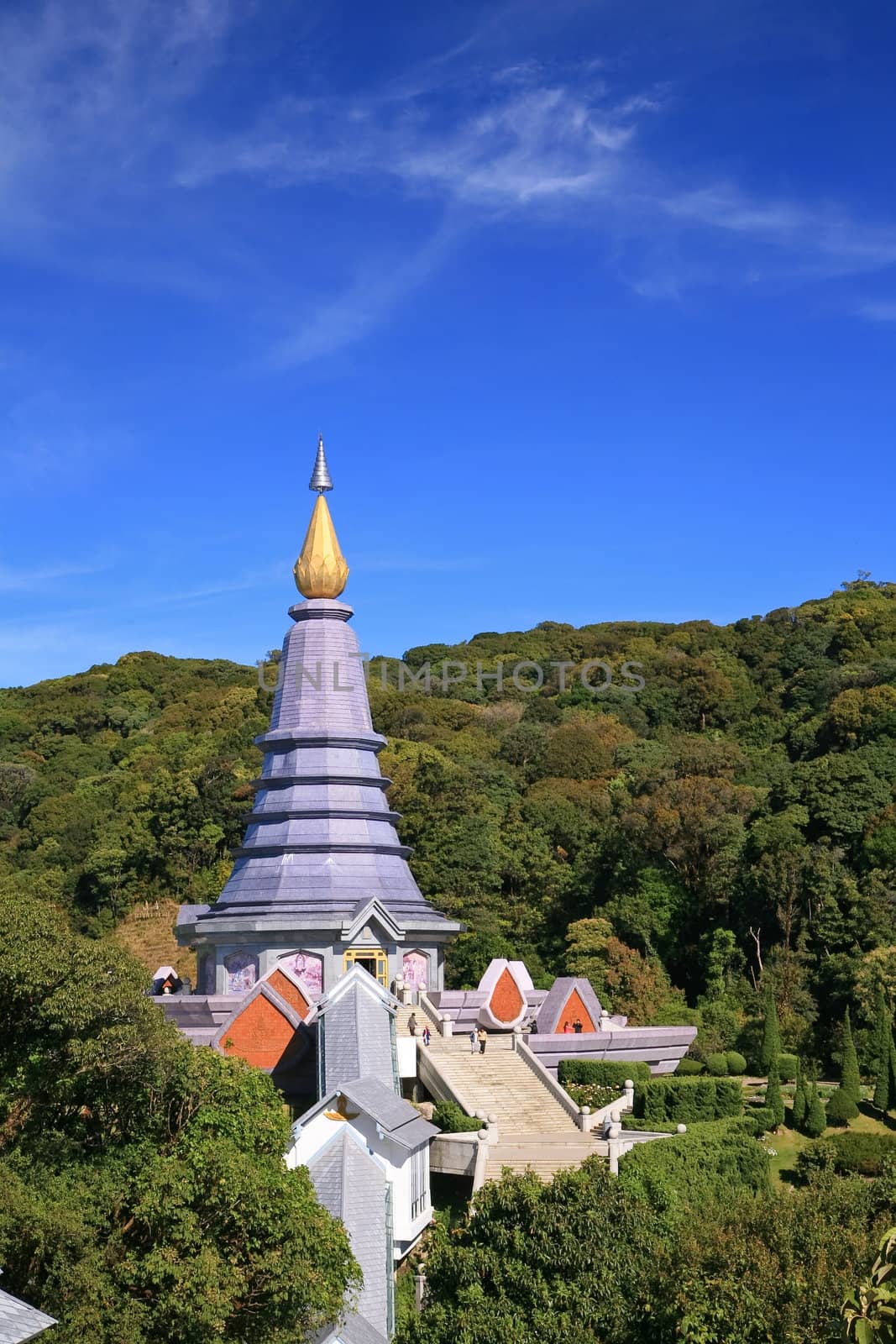 The golden pagoda on the background of the sky.