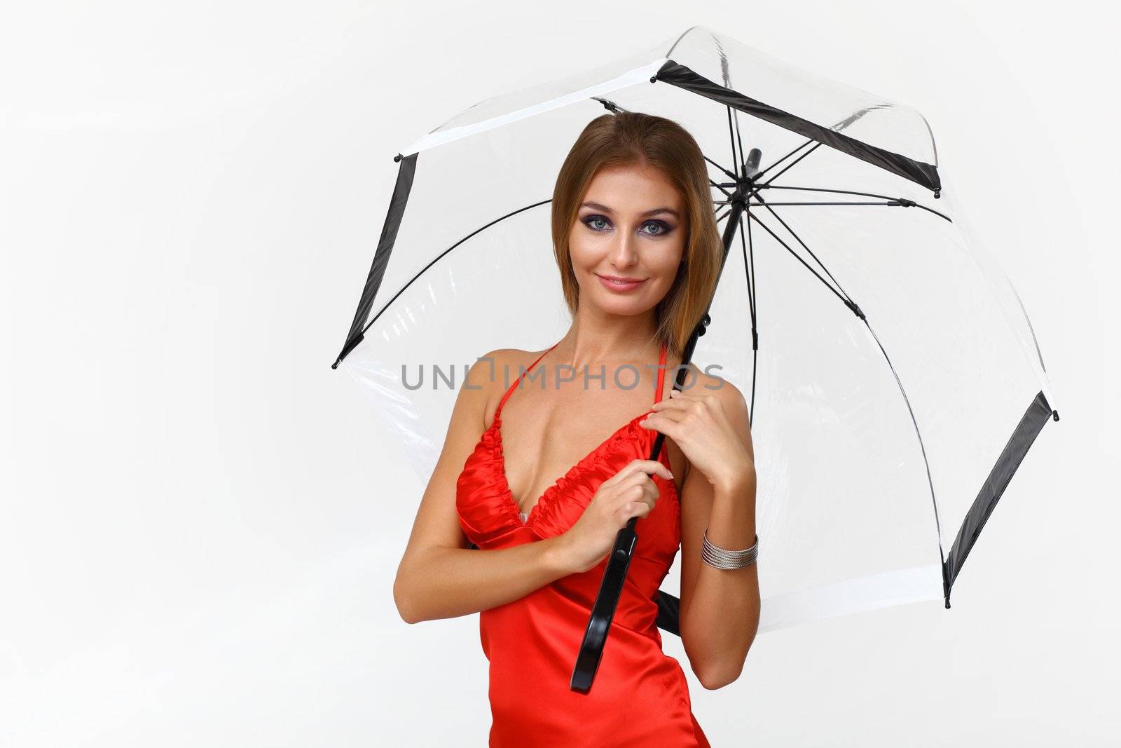 Portrait of young woman with umbrella by sergey_nivens