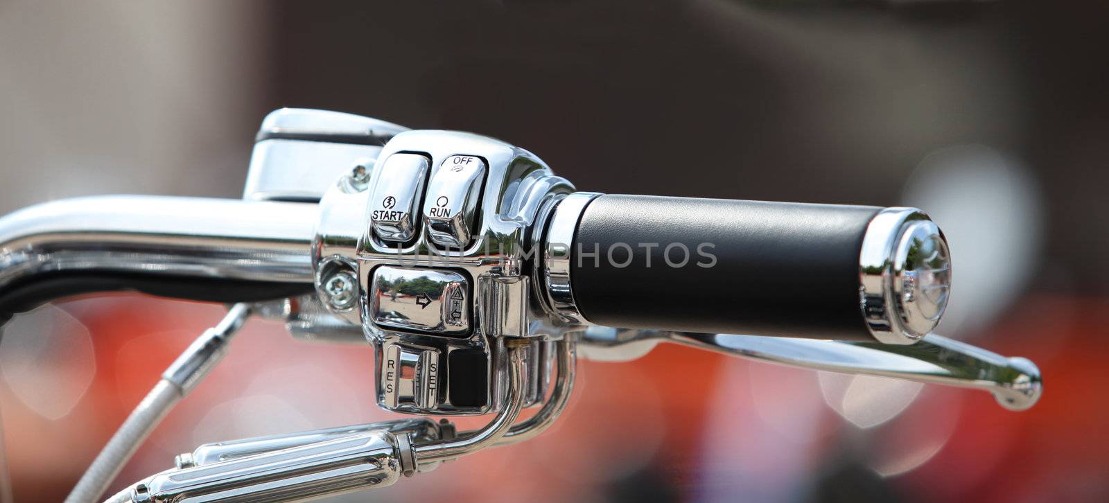 Steering wheel motorcycle throttle control lever close up