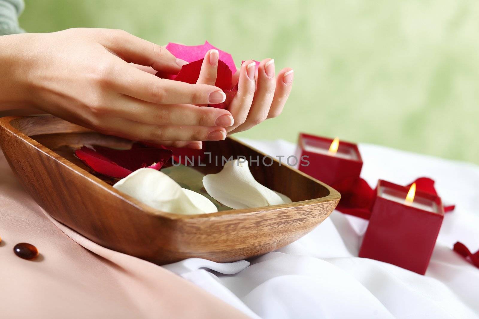 Female hands and manicure related objects in spa salon