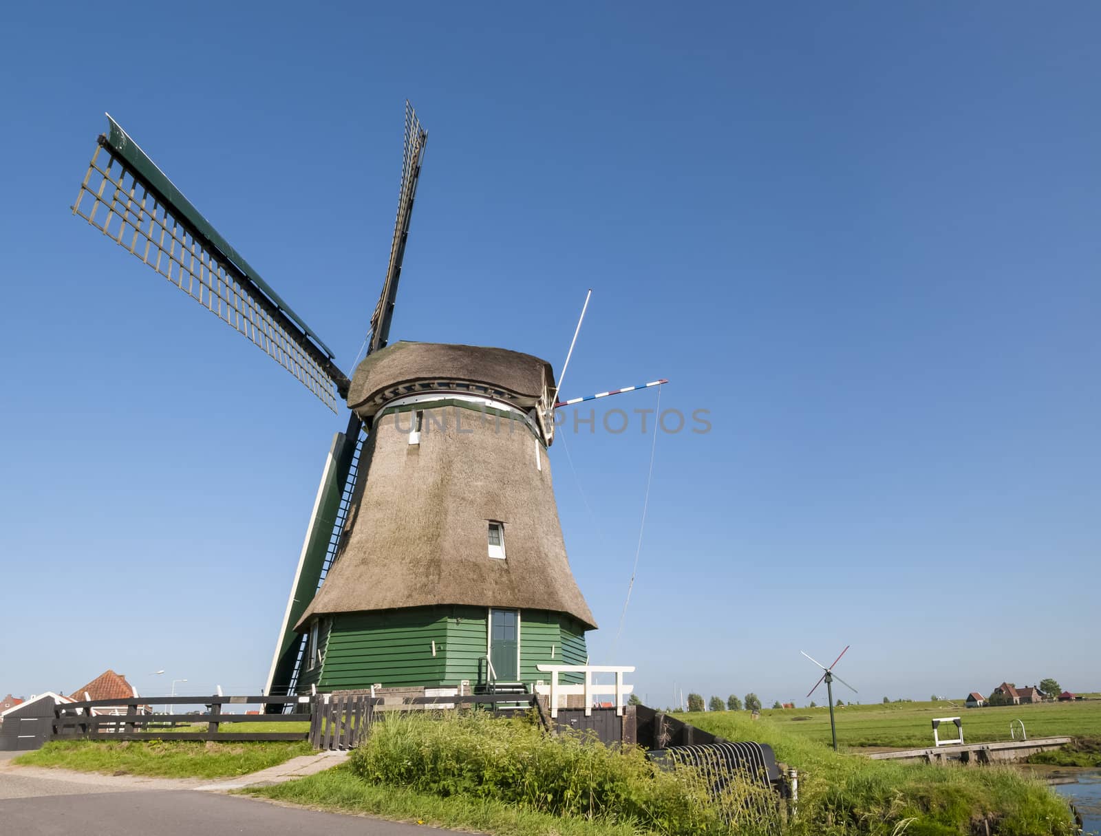 Katwoude windmill in Volendam, Holland, in a bright sunny day