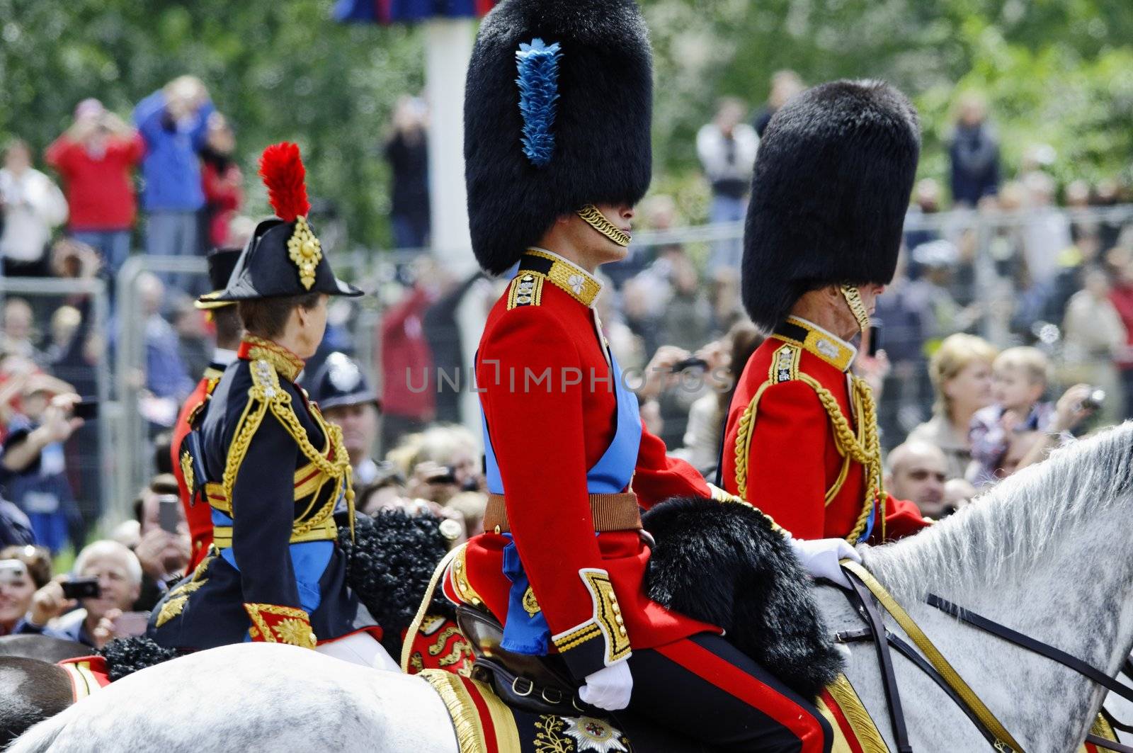 LONDON, UK - June 16: Prince William, the Duke of Kent and Princess Ann during Trooping the Colour ceremony on the Mall and at Buckingham Palace, on June 16, 2012 in London. Trooping the Colour takes place every year in June to officialy celebrate the sovereign birthday.