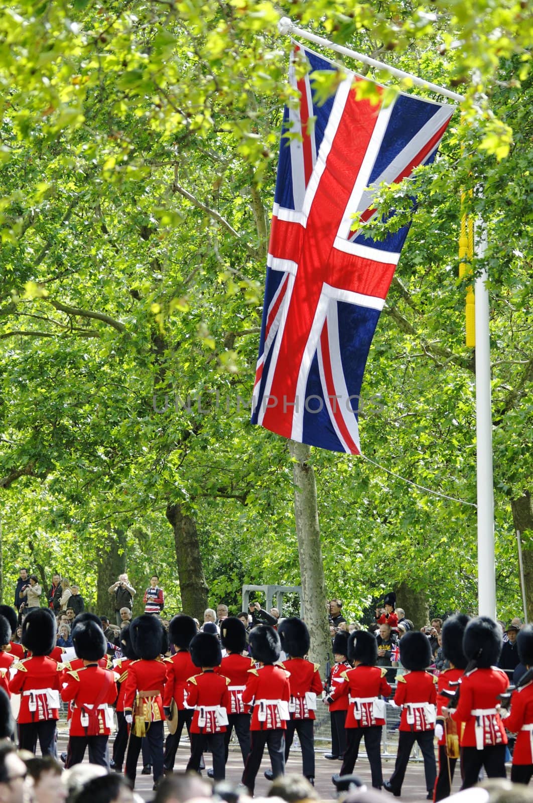 LONDON, UK - June 16: Trooping the Colour ceremony on the Mall and at Buckingham Palace, on June 16, 2012 in London. Trooping the Colour takes place every year in June to officialy celebrate the sovereign birthday.