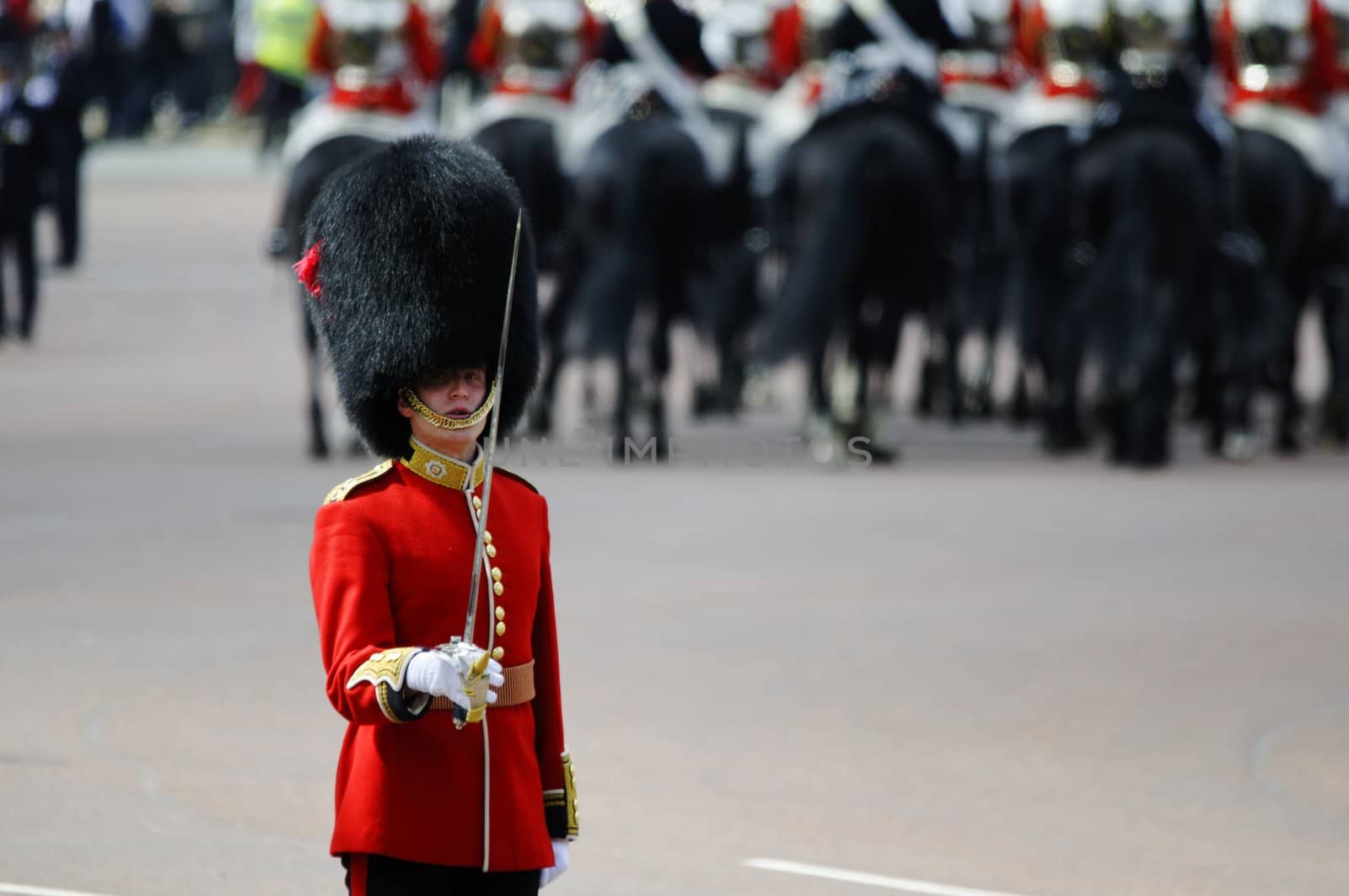 LONDON, UK - June 16: Trooping the Colour ceremony on the Mall and at Buckingham Palace, on June 16, 2012 in London. Trooping the Colour takes place every year in June to officialy celebrate the sovereign birthday.