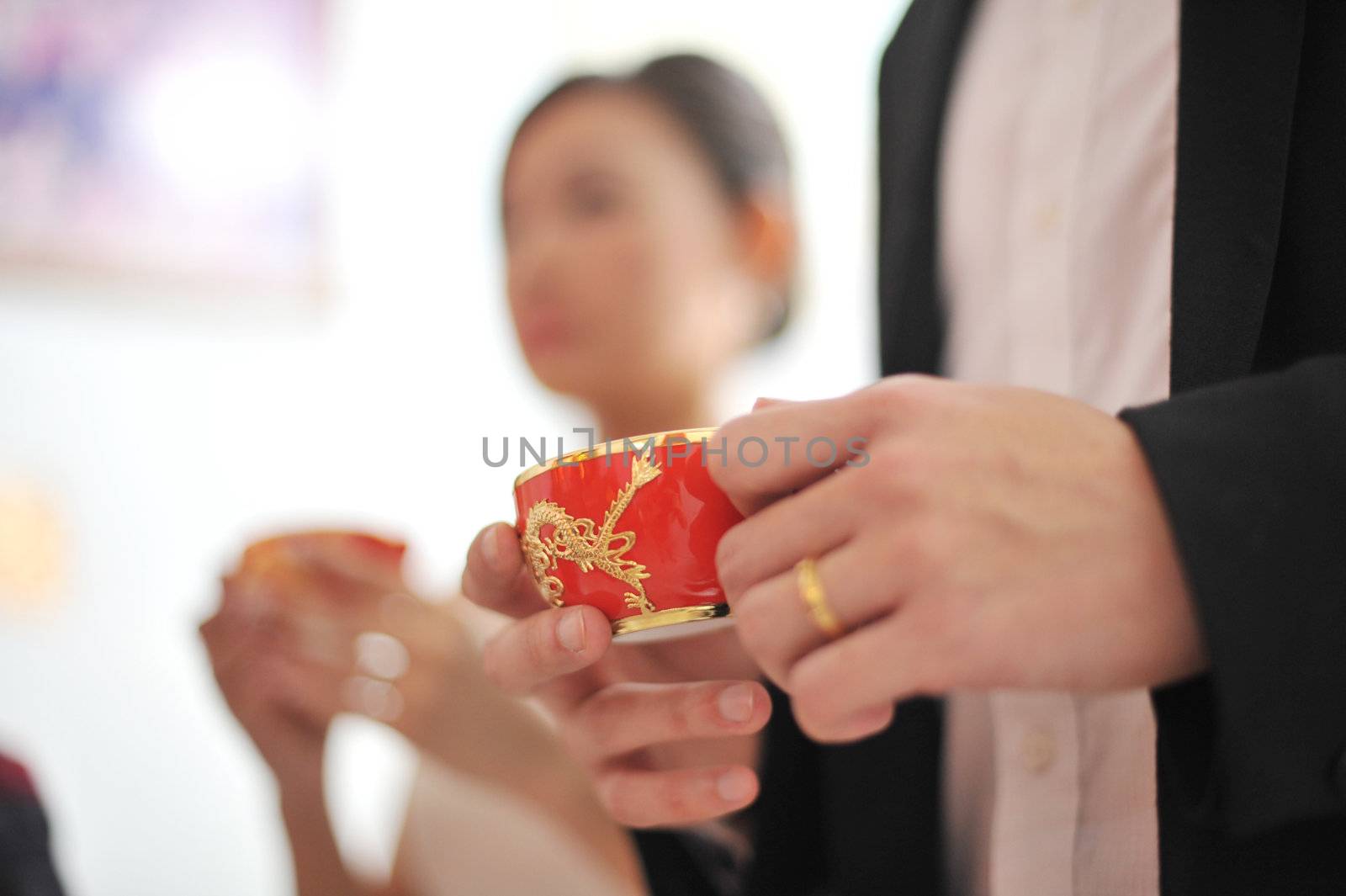 Traditional Chinese wedding tea ceremony, focus on teacup