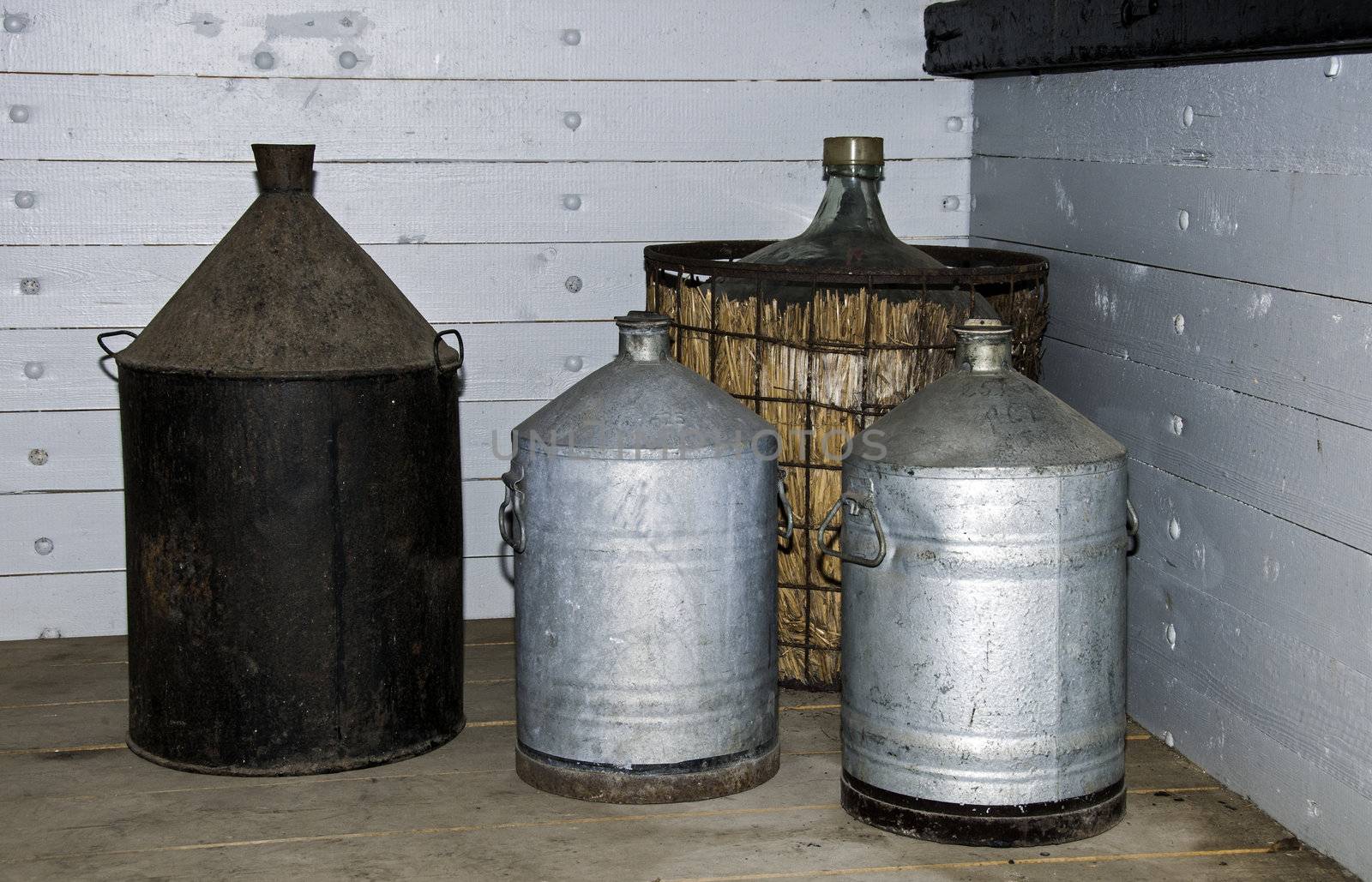 stil life with old churn and wine bottle