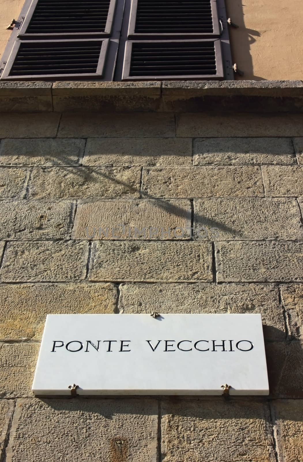 Ponte vecchio wall sign at the begging of the famous bridge in Florence.