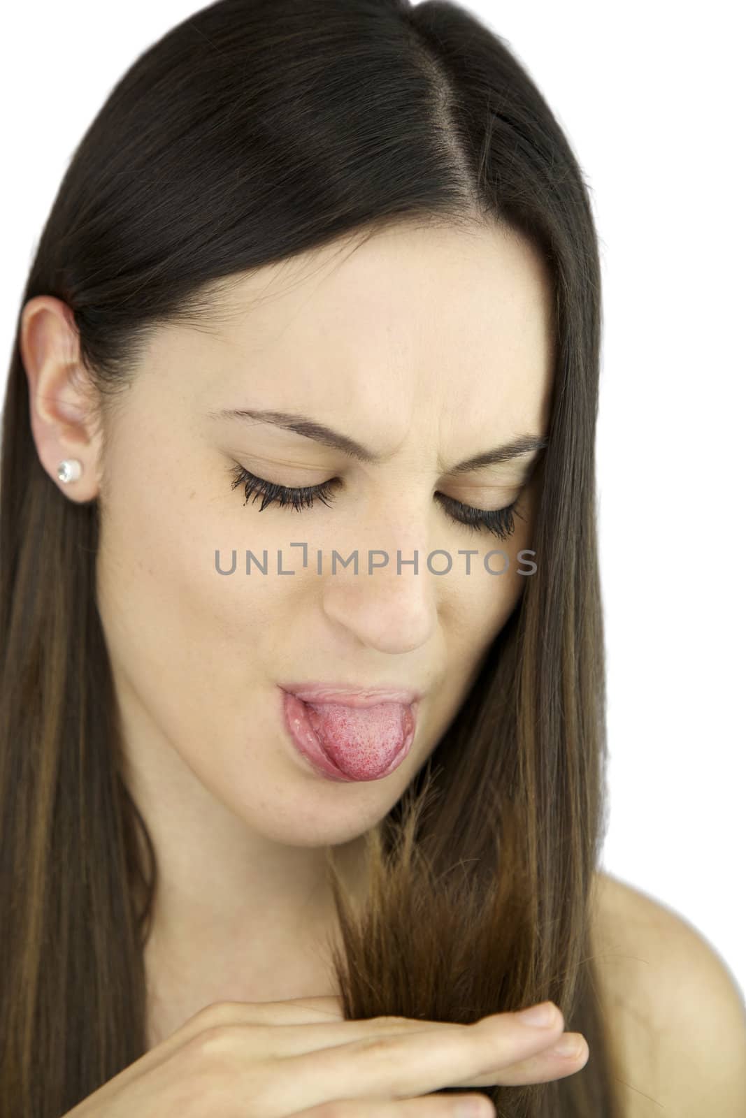 Angry girl making tongue to ruined hair by fmarsicano