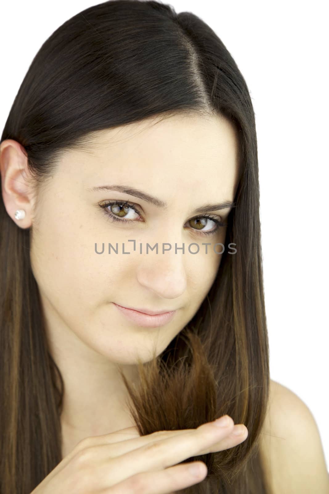 Young woman showing sad bad hair with split ends by fmarsicano