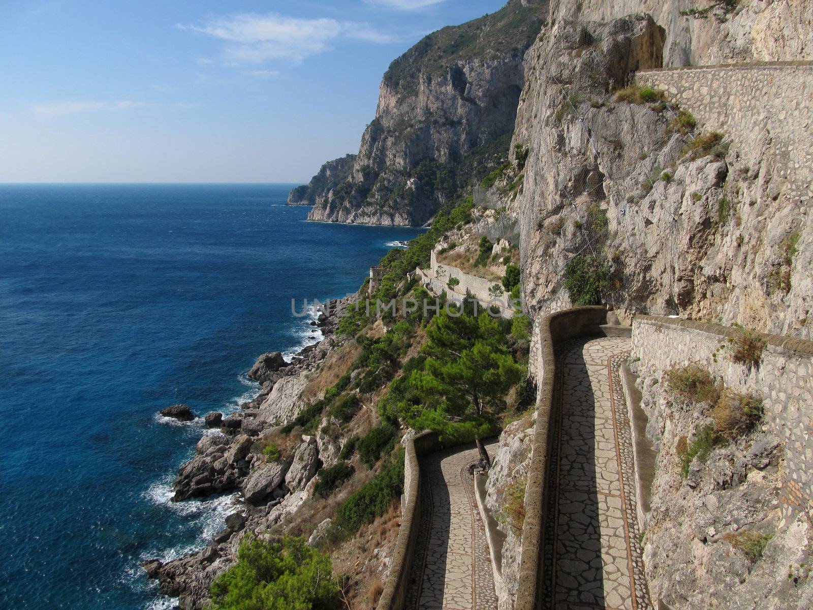 Via Krupp shot - the famous scenic footpath on island Capri in a summer sunny afternoon.