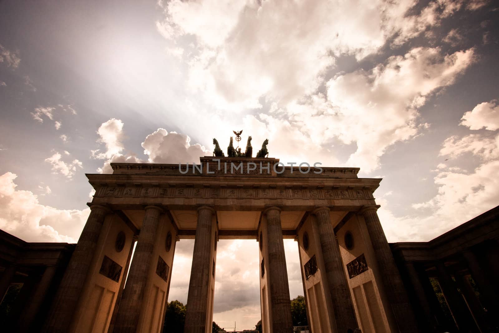 Brandenburg Gate against a dramatic sky by jrstock