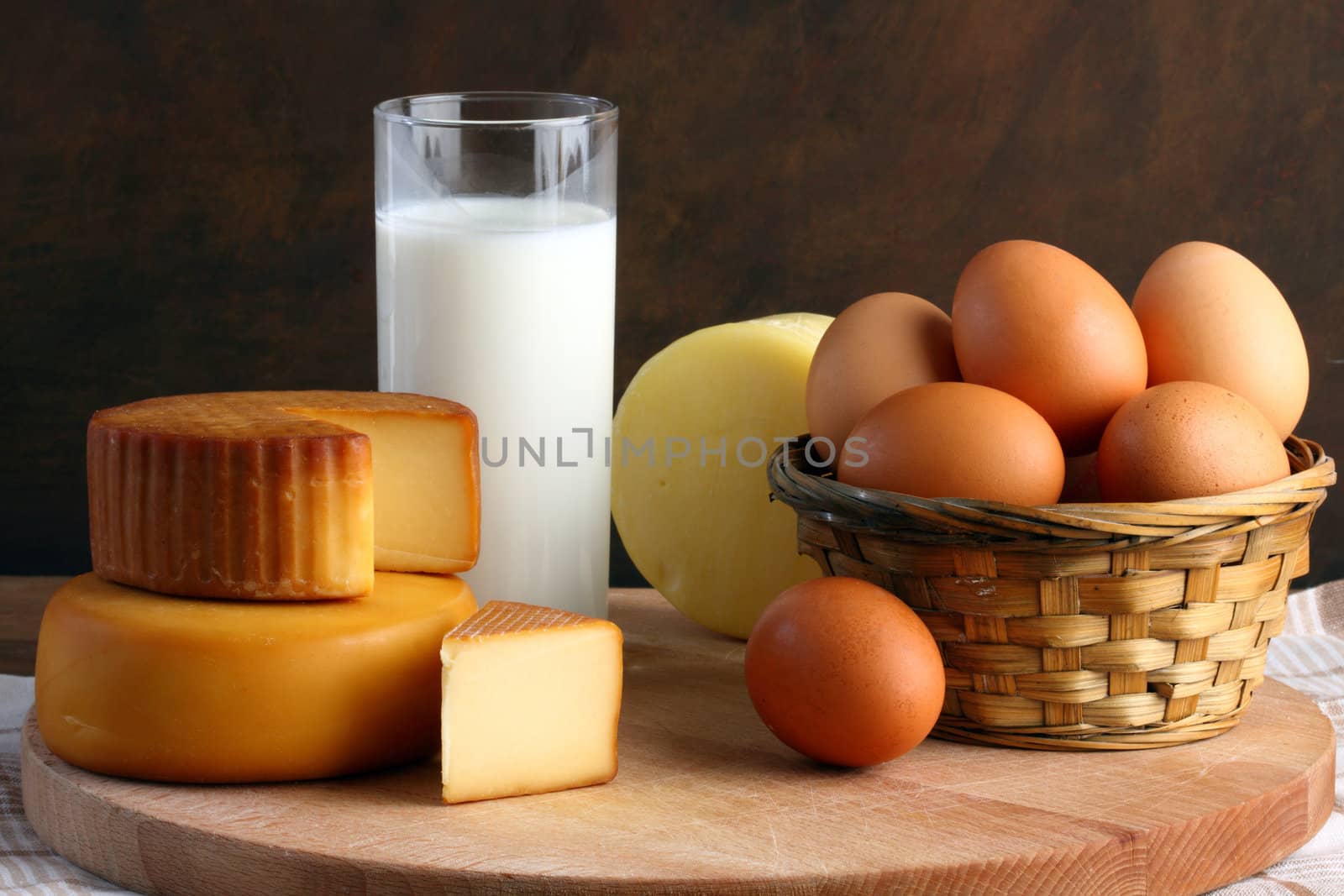 Several types of cheese, milk and eggs