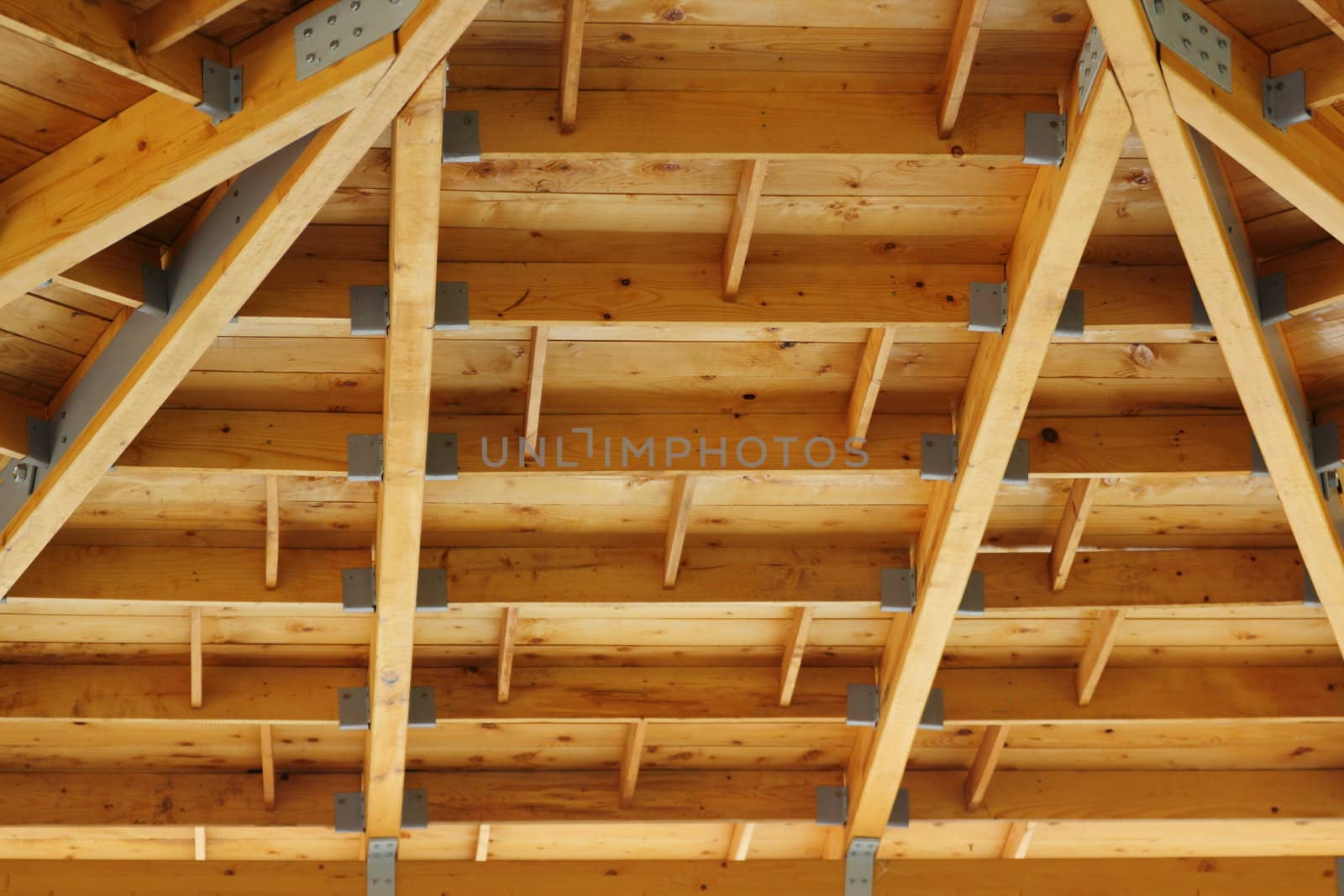 spruce wooden structure at the interior of a roof