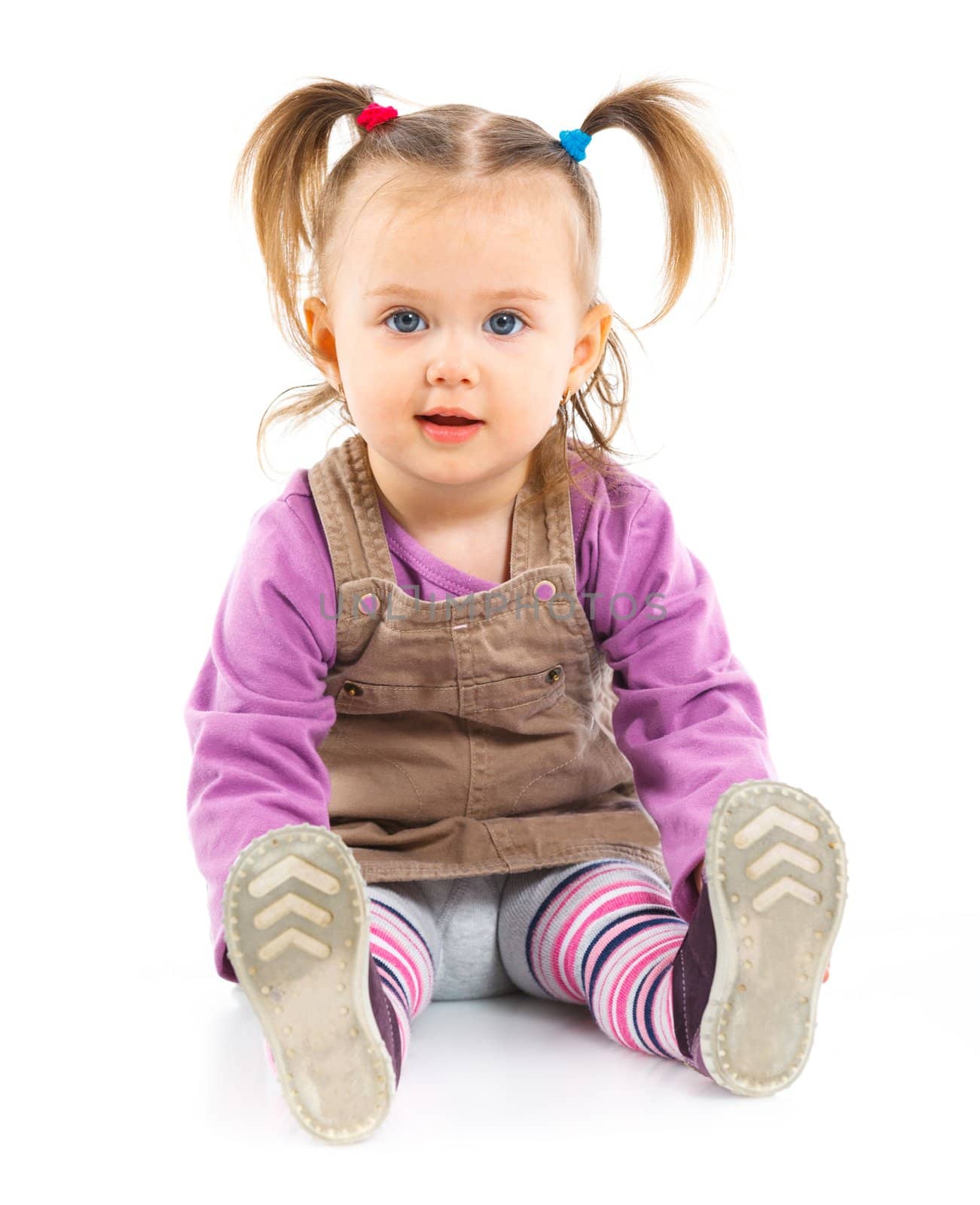 Little fashionable baby girl. Isolated on white background