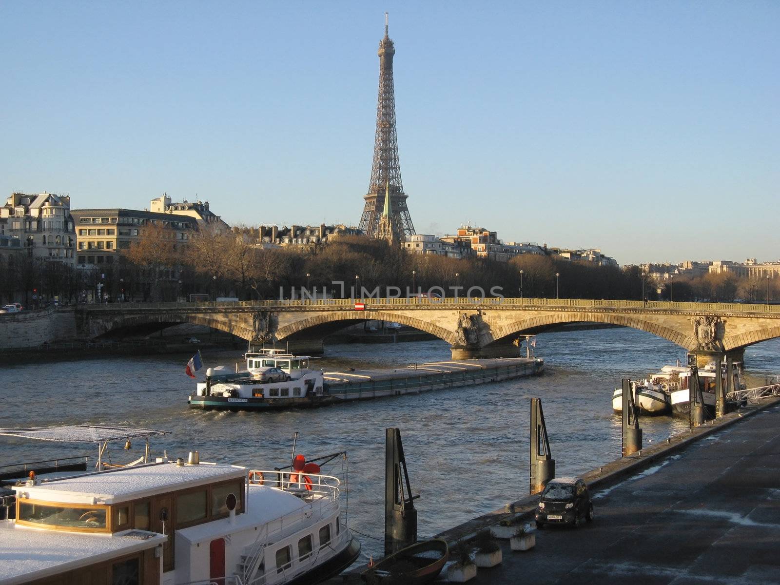 View toward Eiffel Tower at the background of river Seine in Paris, France.