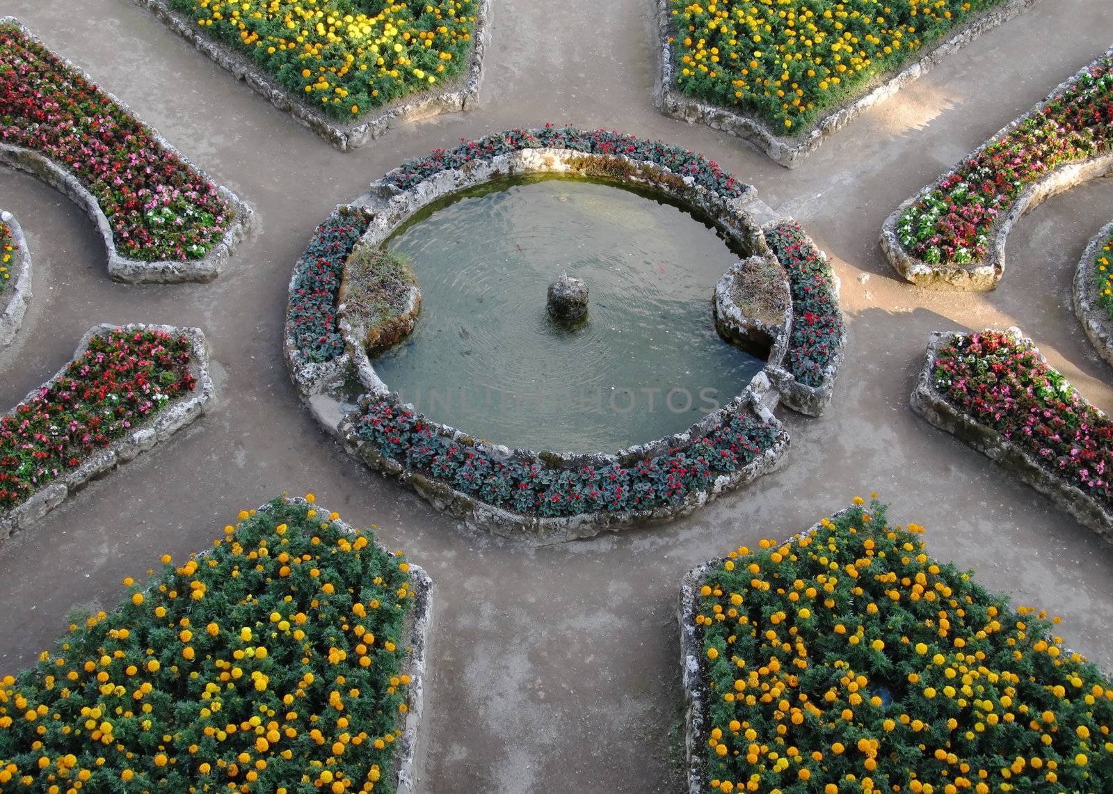 Colorful garden with a fountain in Vila Rufolo, Ravello on Amalfi coast.                               